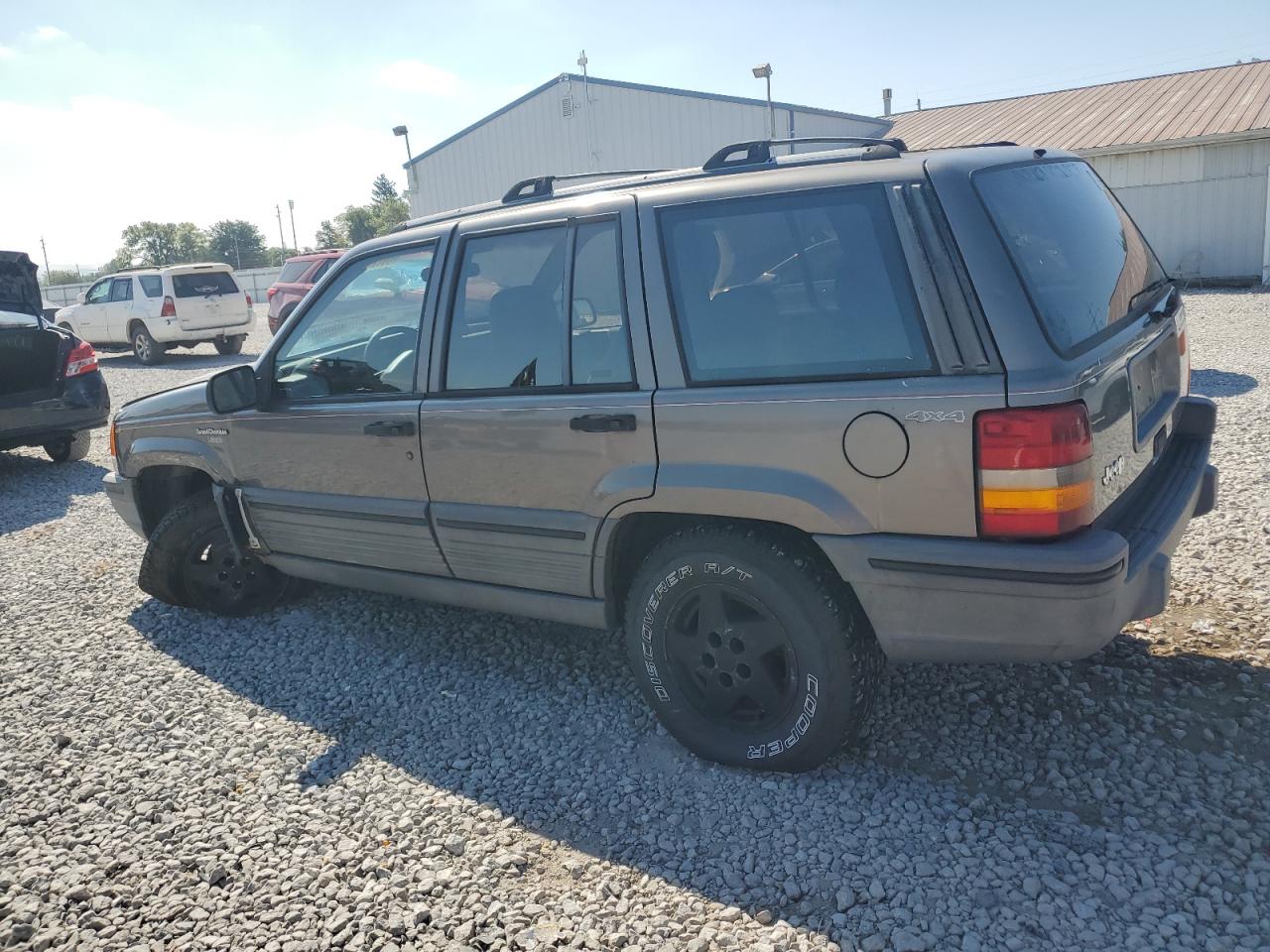 1994 Jeep Grand Cherokee Laredo Желто-коричневый vin: 1J4GZ58S2RC328789