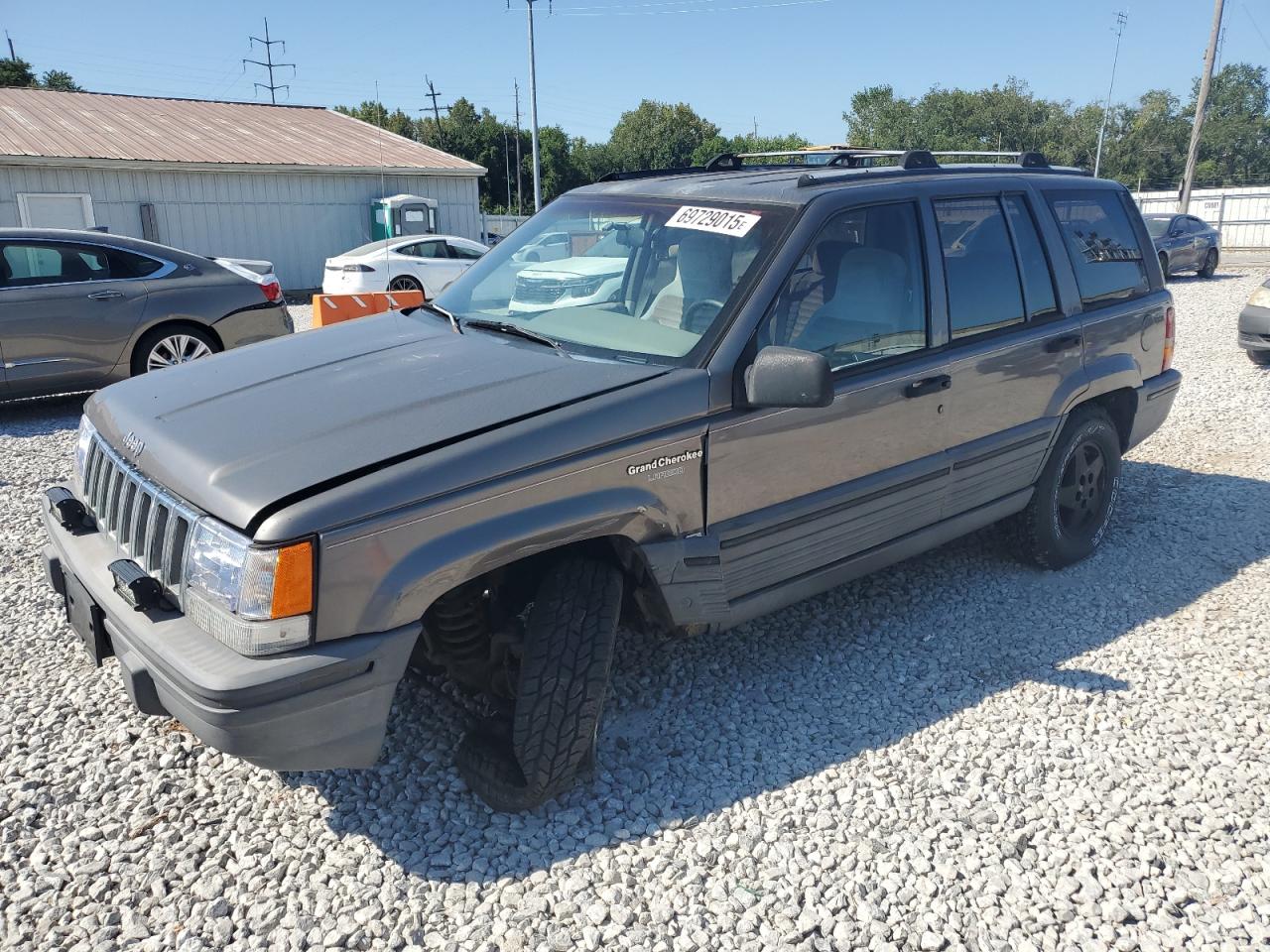 1994 Jeep Grand Cherokee Laredo Желто-коричневый vin: 1J4GZ58S2RC328789