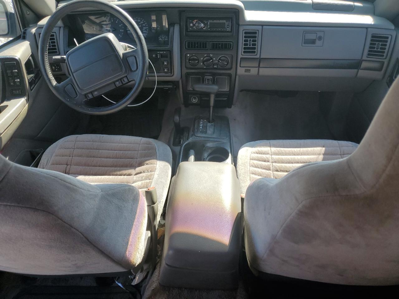1994 Jeep Grand Cherokee Laredo Желто-коричневый vin: 1J4GZ58S2RC328789