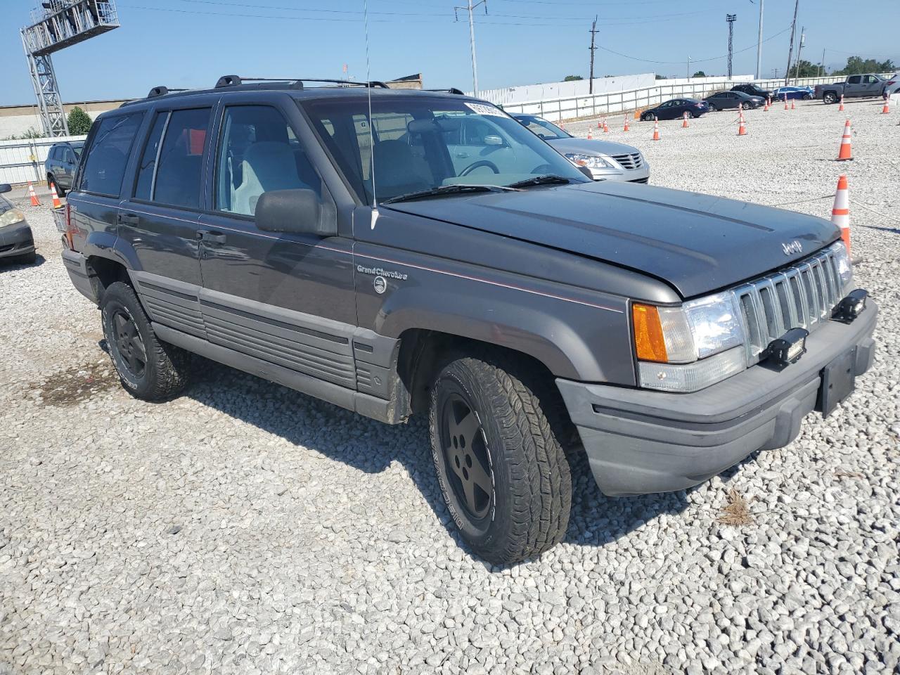 1994 Jeep Grand Cherokee Laredo Желто-коричневый vin: 1J4GZ58S2RC328789