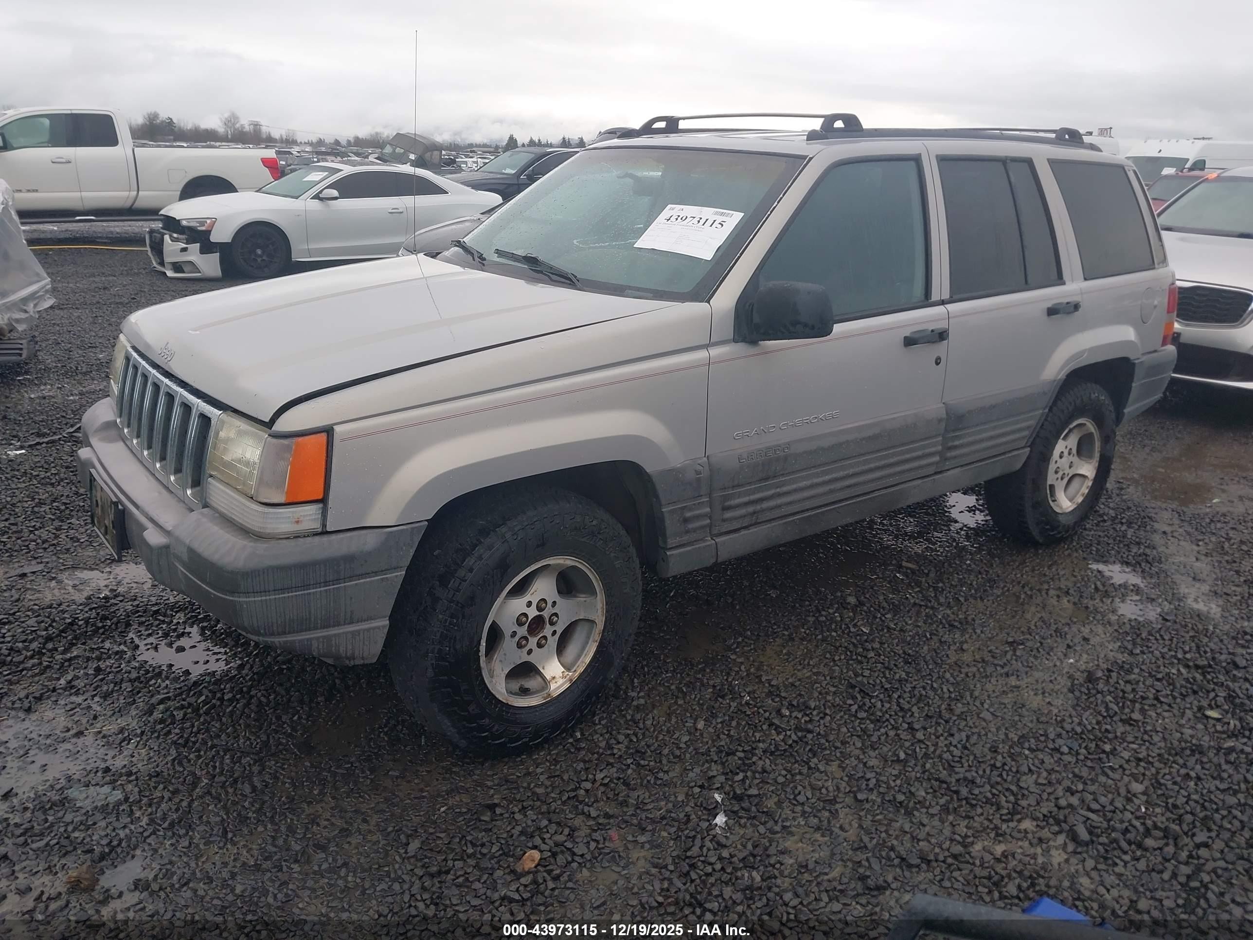 1997 Jeep Grand Cherokee Laredo/tsi Tan vin: 1J4GZ58S3VC508633