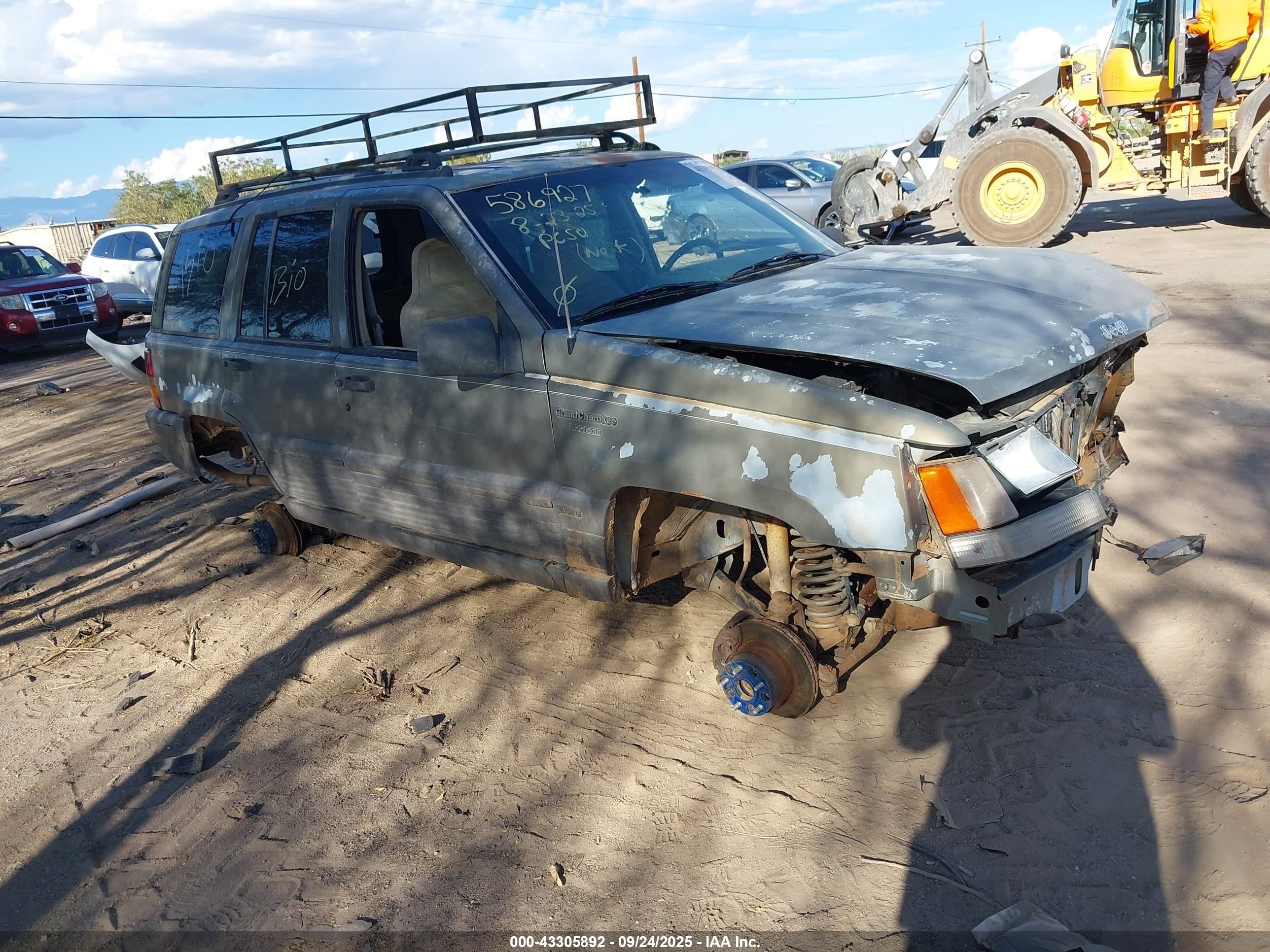 1995 Jeep Grand Cherokee Laredo Коричневый vin: 1J4GZ58S9SC569349