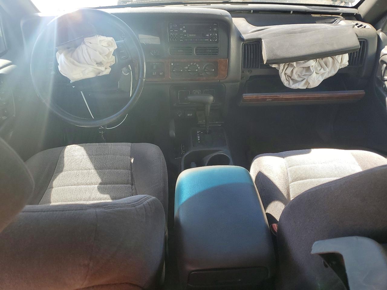 1998 Jeep Grand Cherokee Burgundy vin: 1J4GZ58S9WC242603