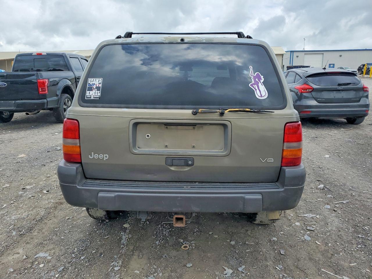 1997 Jeep Grand Cherokee Cream vin: 1J4GZ58Y1VC709046