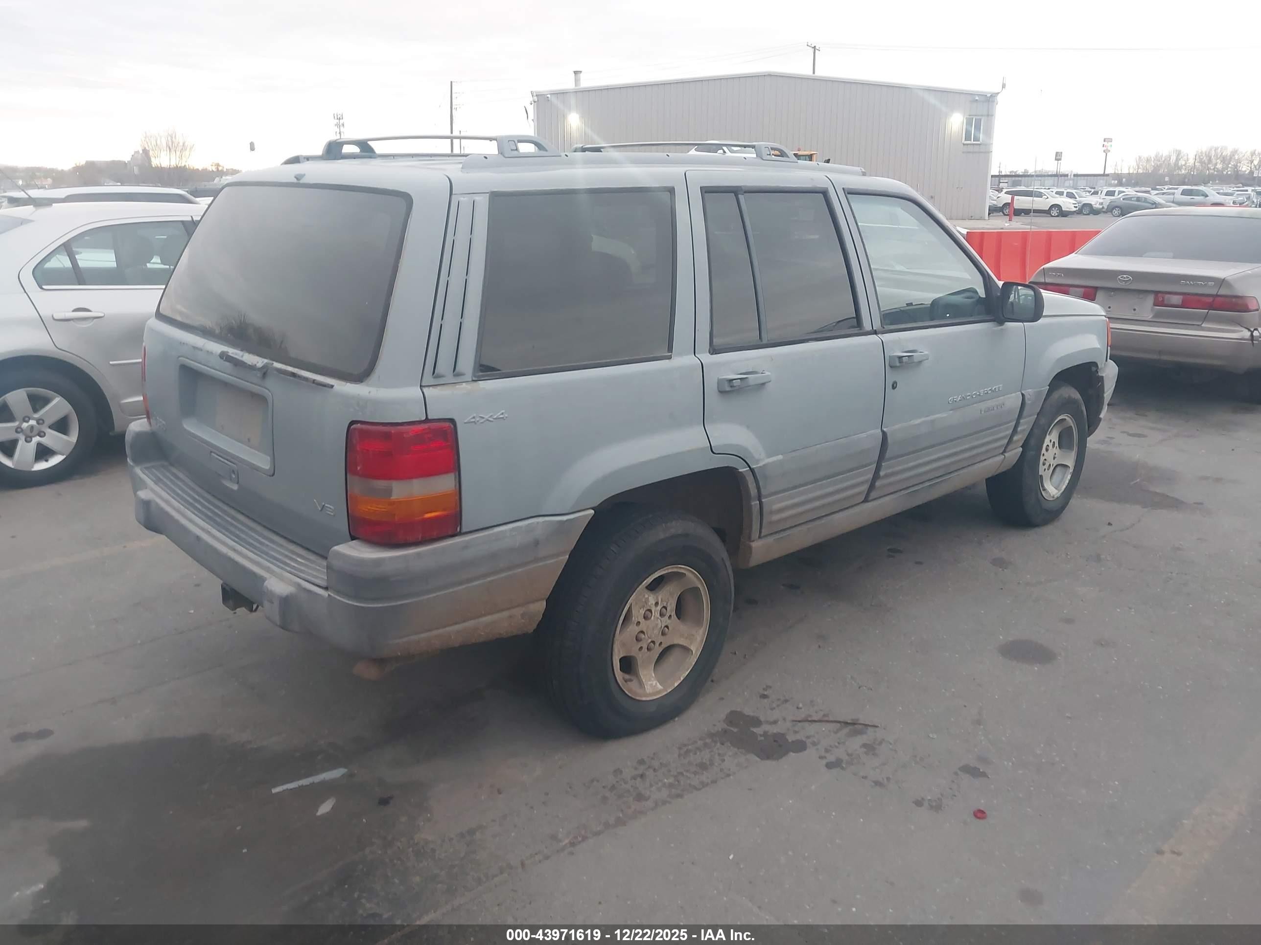 1996 Jeep Grand Cherokee Laredo Серый vin: 1J4GZ58Y6TC384472