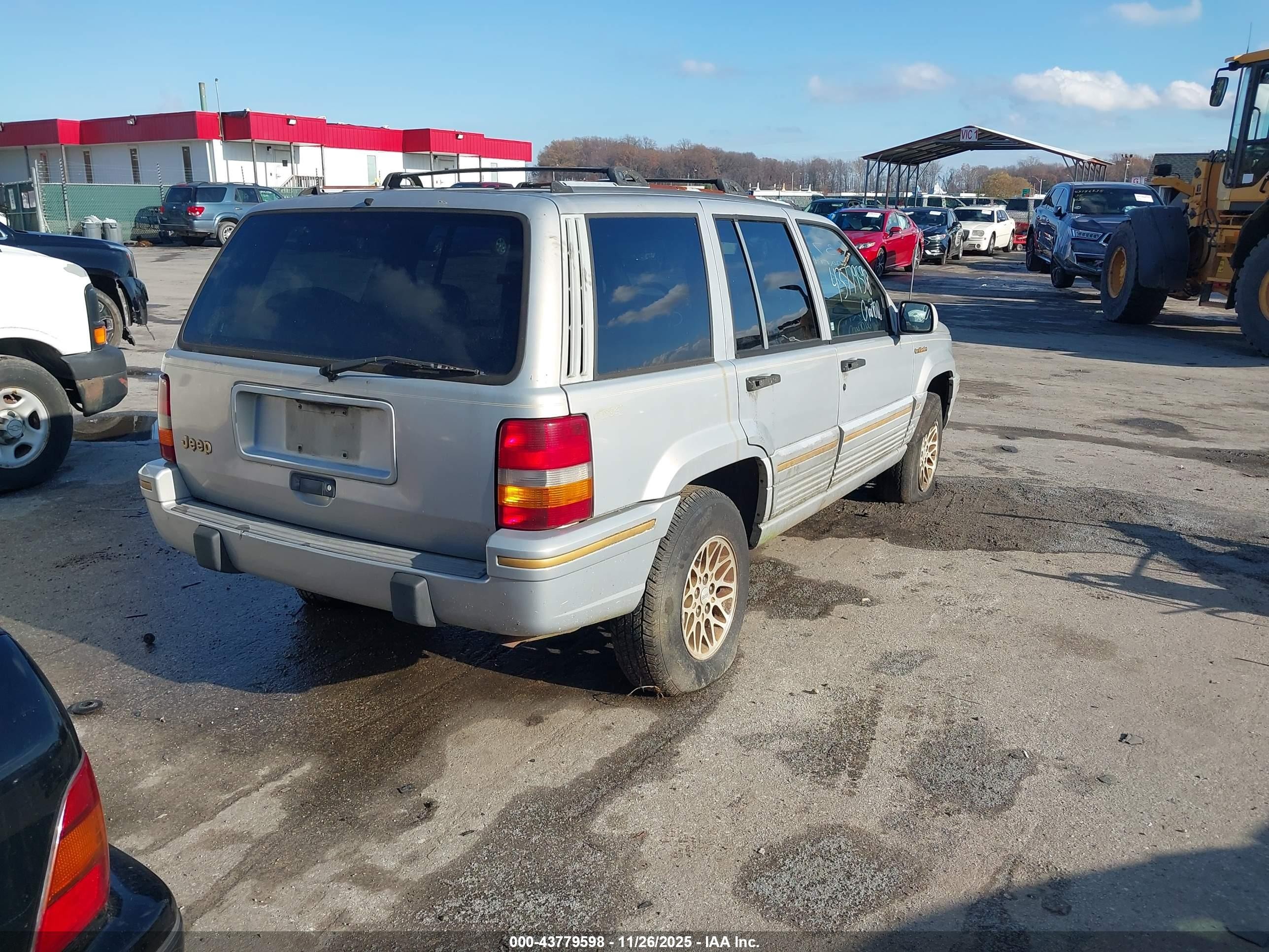 1995 Jeep Grand Cherokee Limited/orvis Silver vin: 1J4GZ78S8SC575493