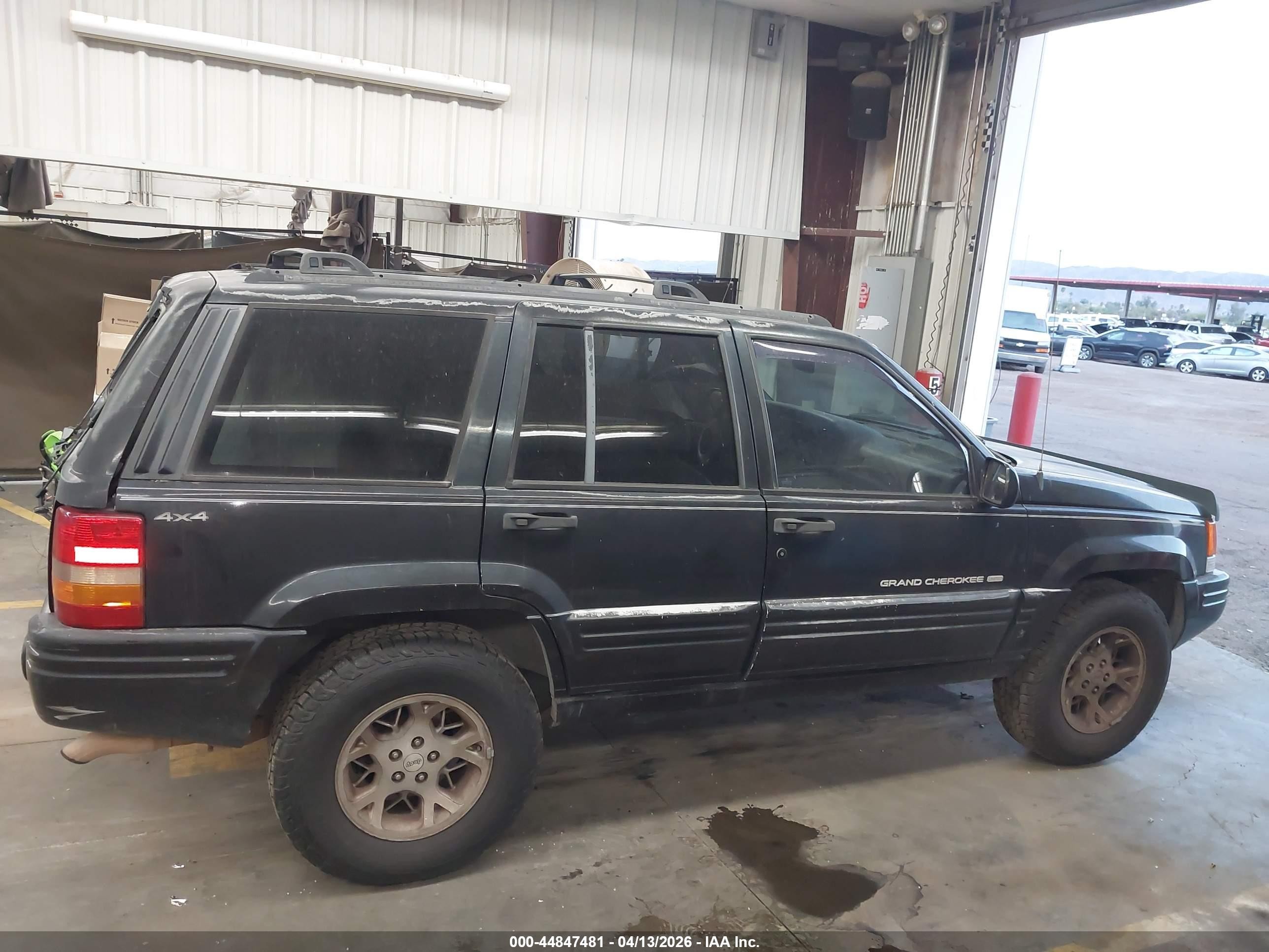 1998 Jeep Grand Cherokee Limited Black vin: 1J4GZ78Y0WC267681