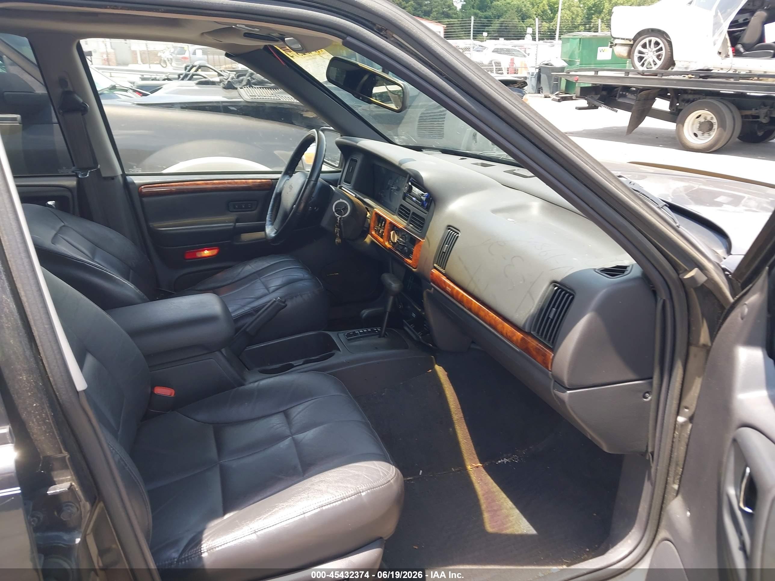 1998 Jeep Grand Cherokee Limited Black vin: 1J4GZ78Y1WC198435
