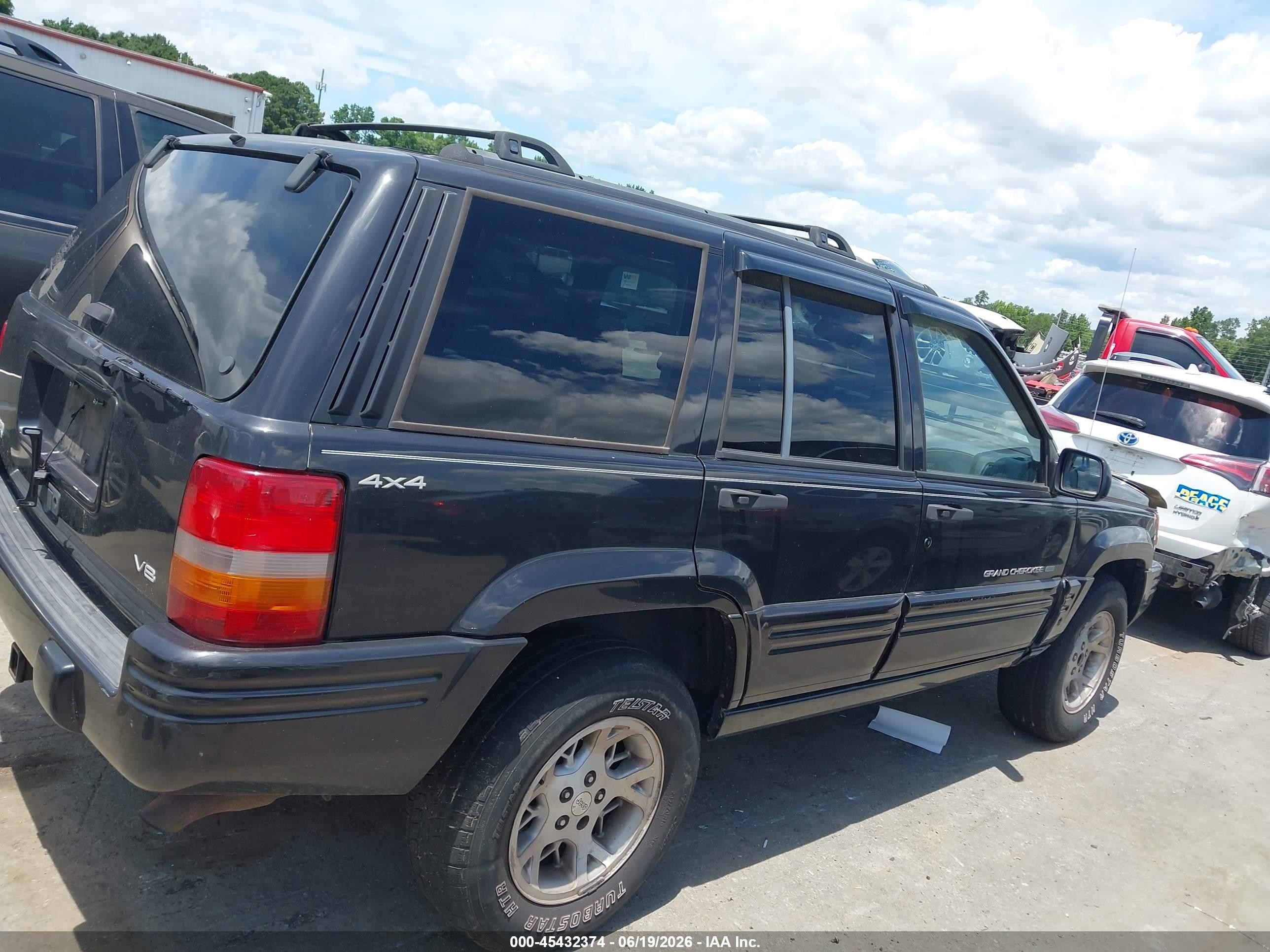1998 Jeep Grand Cherokee Limited Black vin: 1J4GZ78Y1WC198435