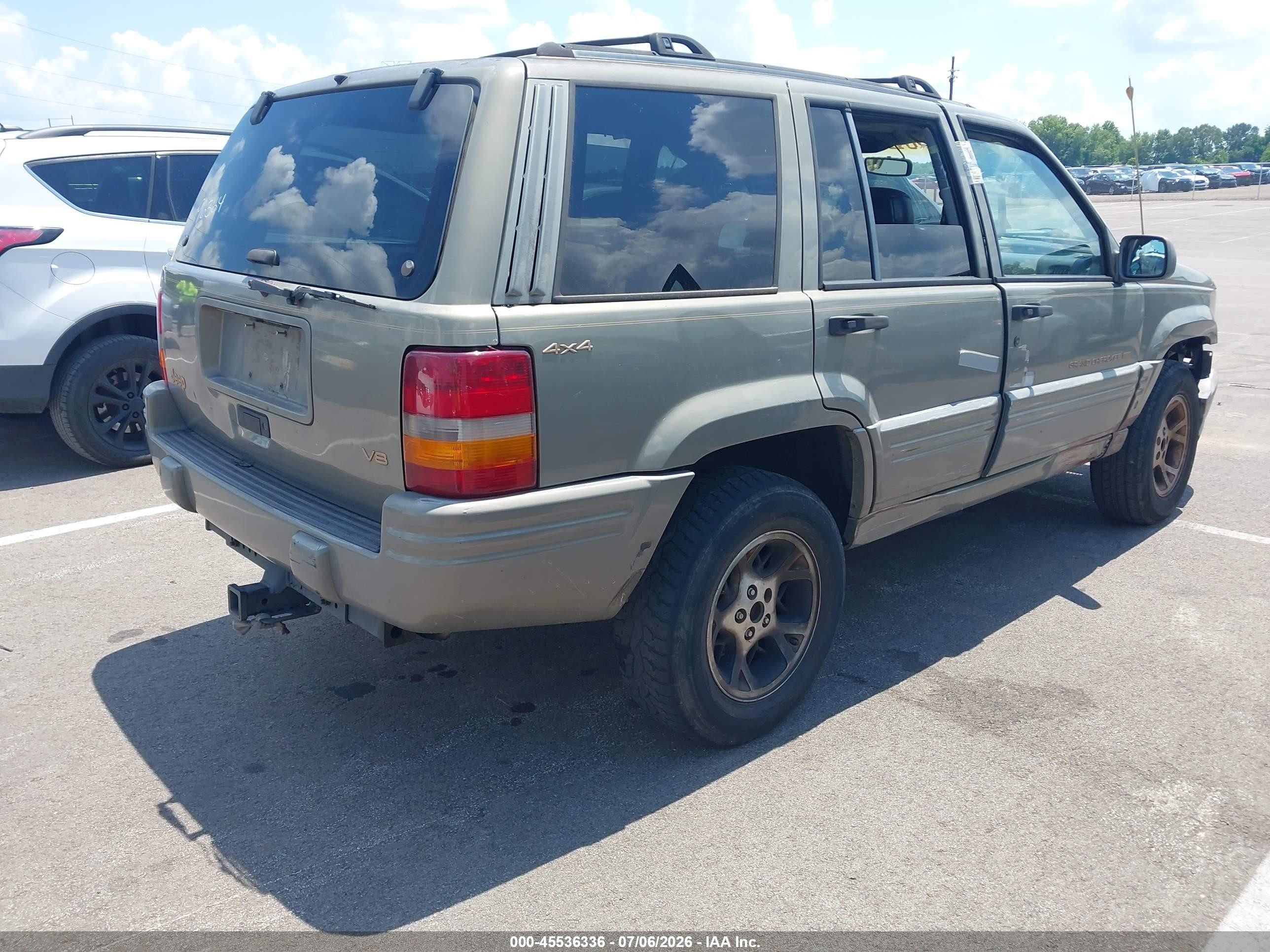 1997 Jeep Grand Cherokee Limited Gold vin: 1J4GZ78Y7VC520722