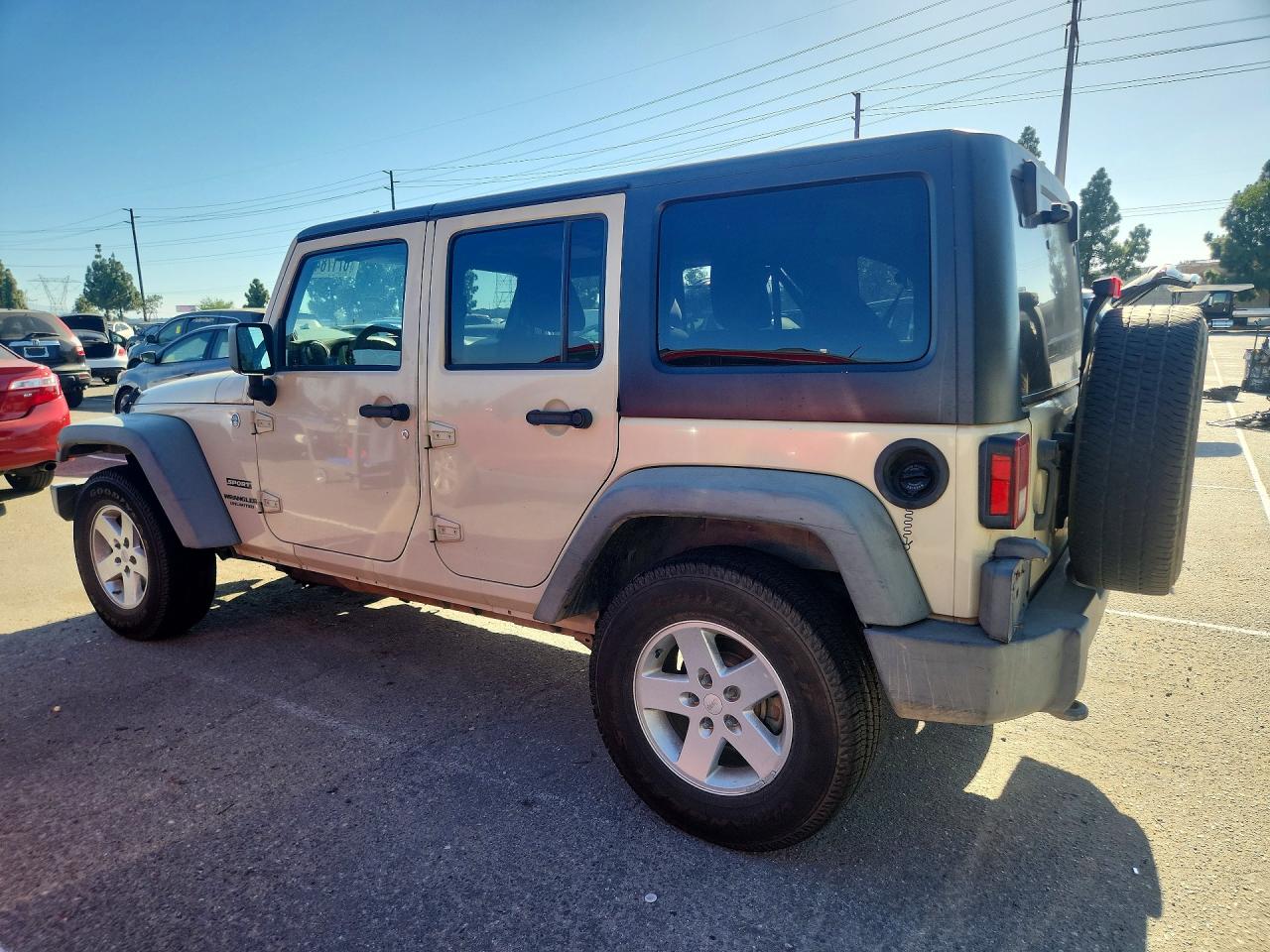 2011 Jeep Wrangler Unlimited Sport Beige vin: 1J4HA3H11BL561611