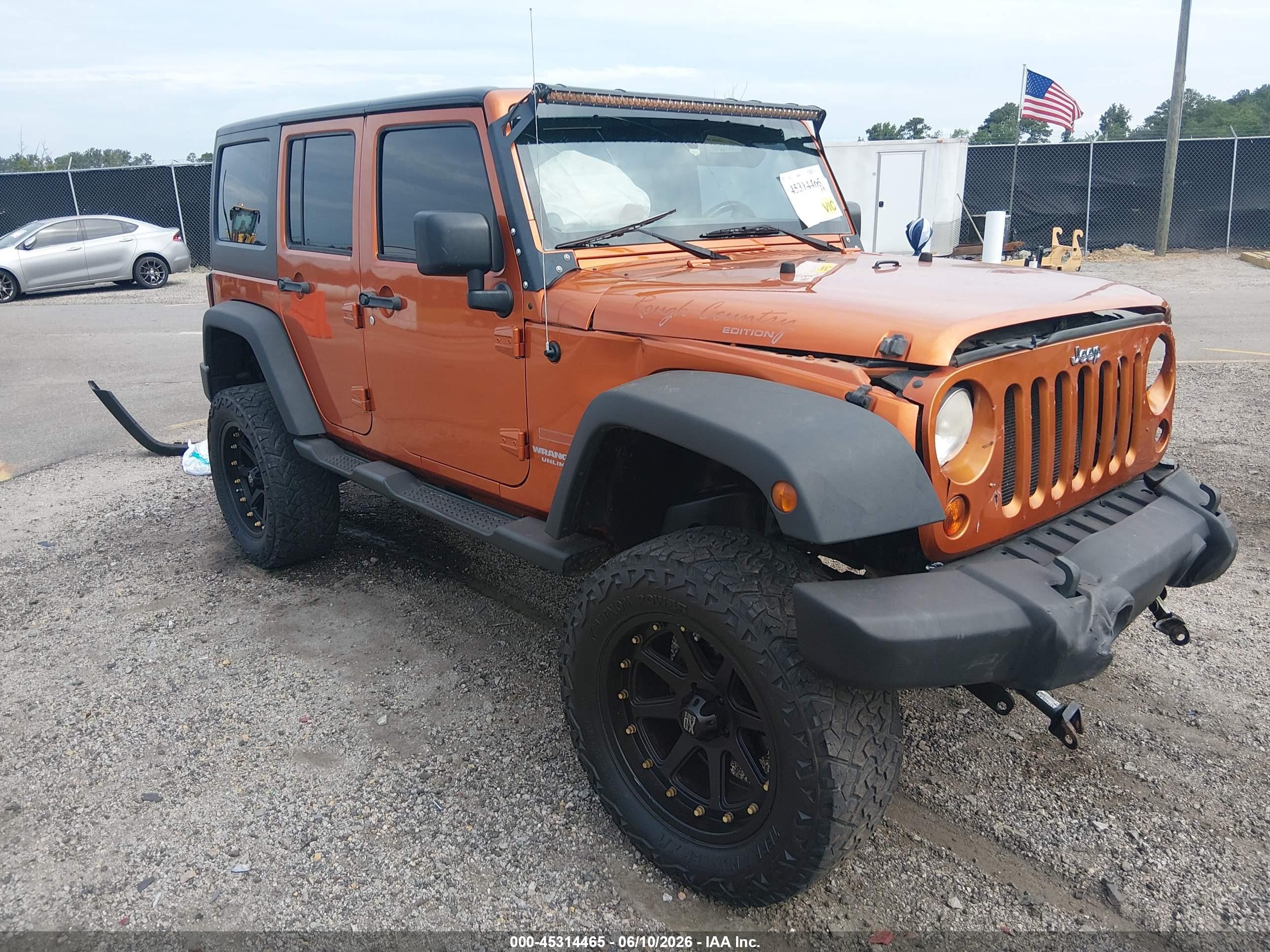 2011 Jeep Wrangler Unlimited Sport Orange vin: 1J4HA3H1XBL503299