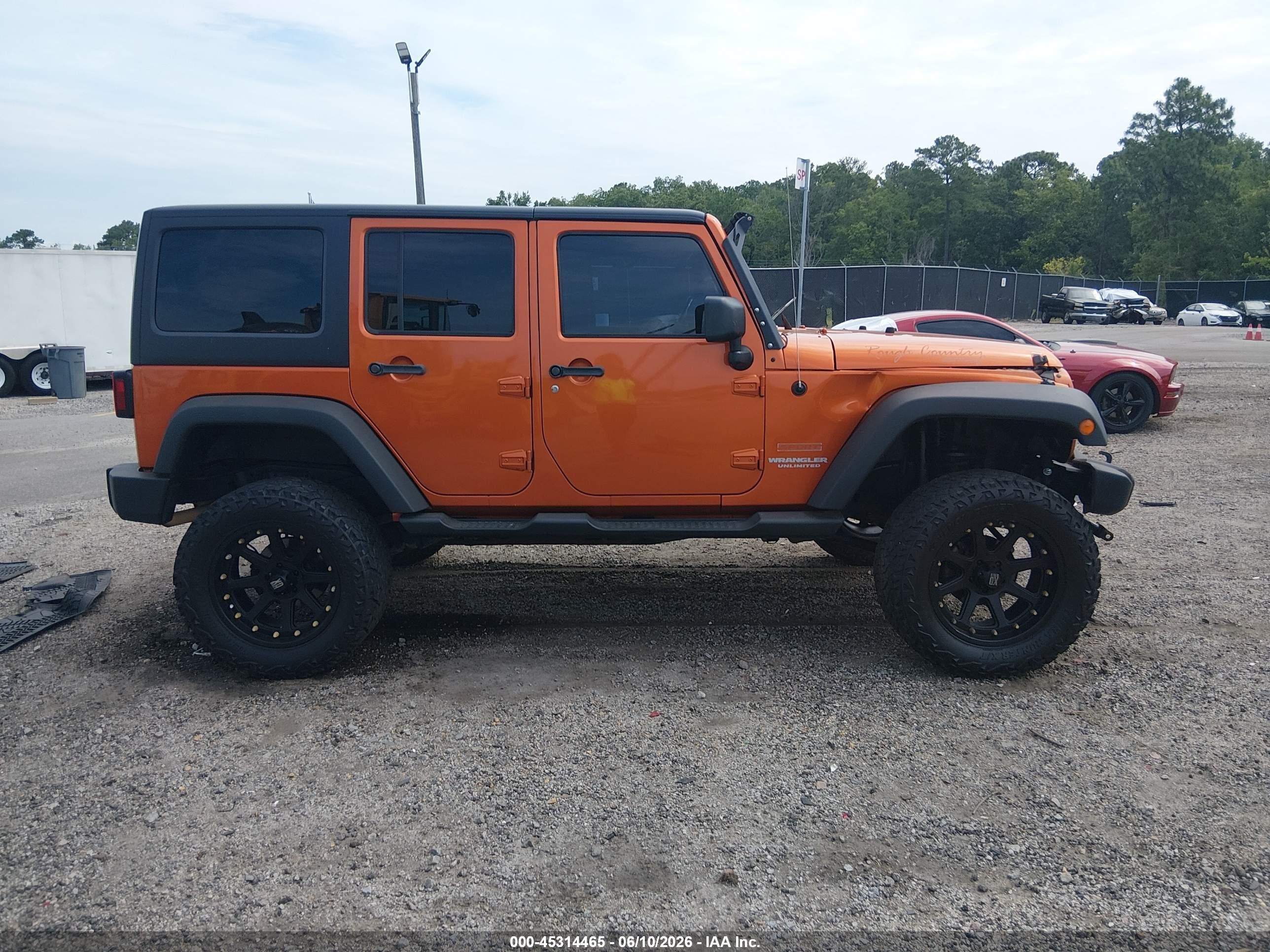 2011 Jeep Wrangler Unlimited Sport Orange vin: 1J4HA3H1XBL503299