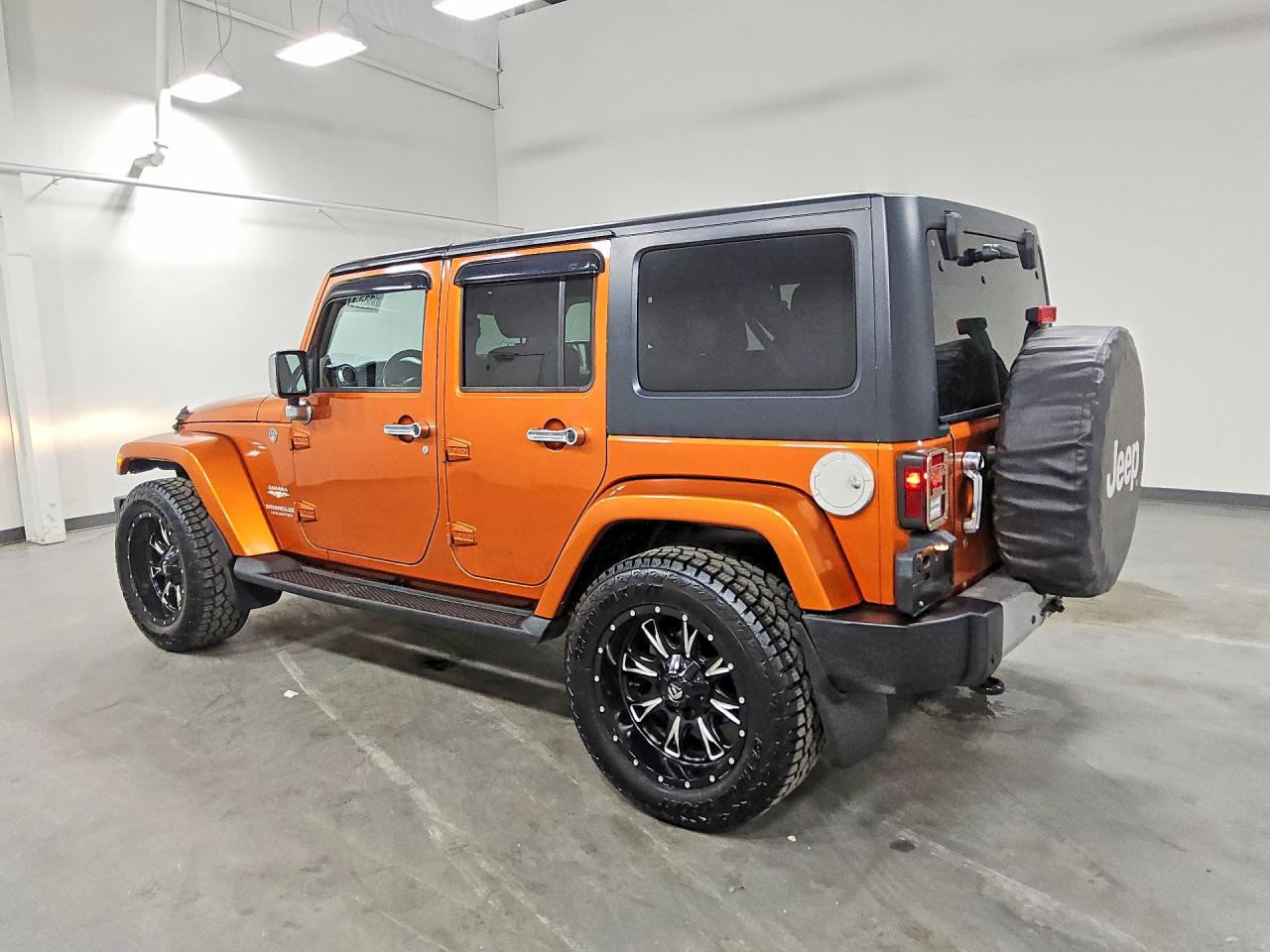 2011 Jeep Wrangler Unlimited Sahara Orange vin: 1J4HA5H11BL542536