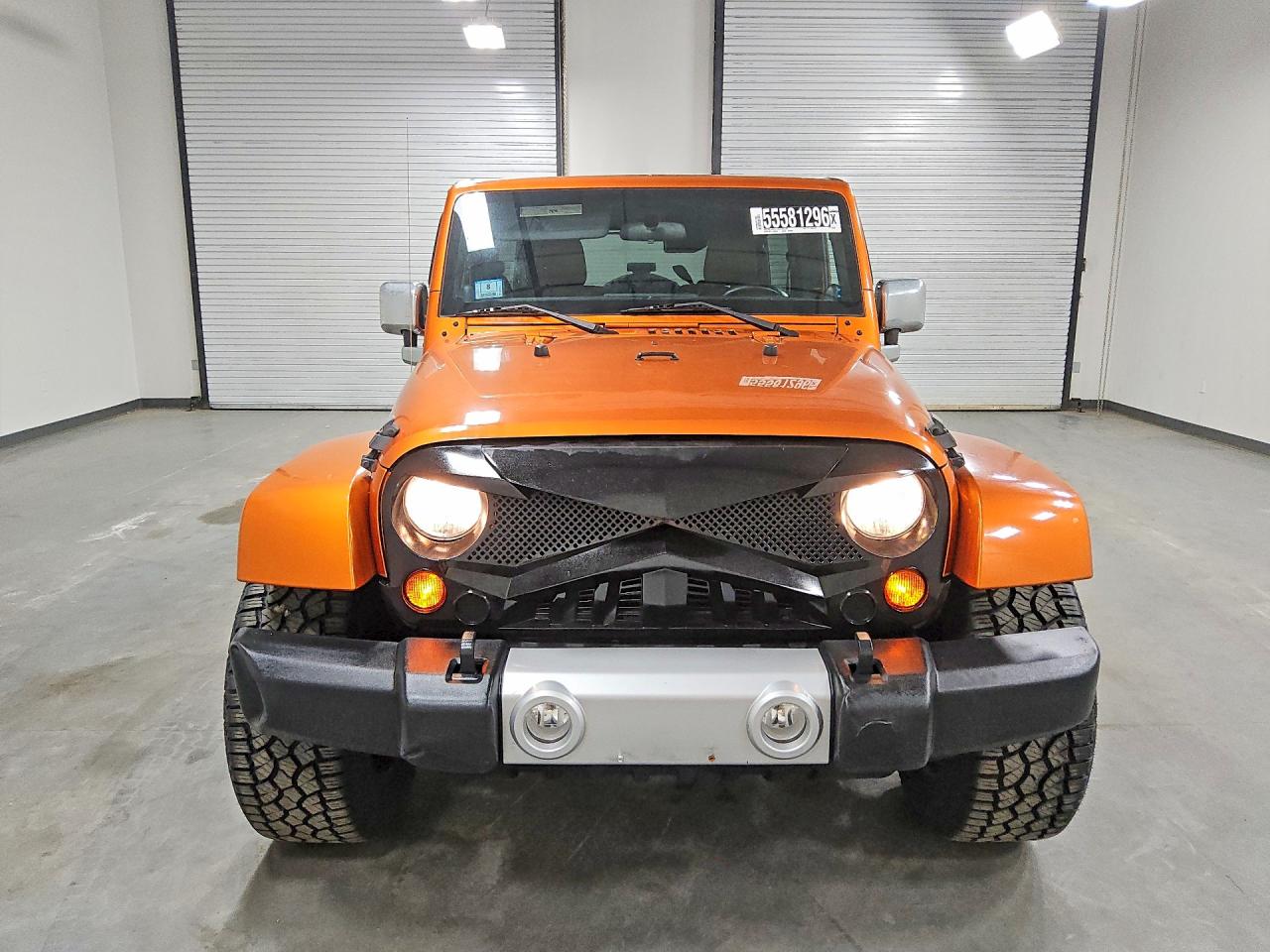 2011 Jeep Wrangler Unlimited Sahara Orange vin: 1J4HA5H11BL542536