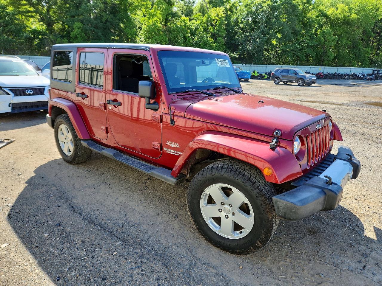 2011 Jeep Wrangler Unlimited Sahara Burgundy vin: 1J4HA5H11BL549020