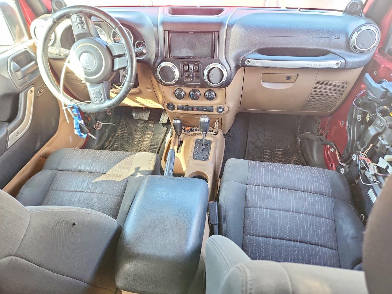 2011 Jeep Wrangler Unlimited Sahara Burgundy vin: 1J4HA5H11BL549020