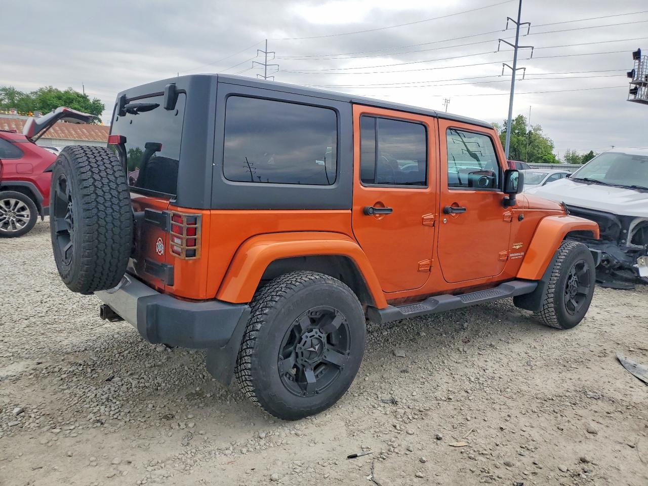 2011 Jeep Wrangler Unlimited Orange vin: 1J4HA5H11BL627103