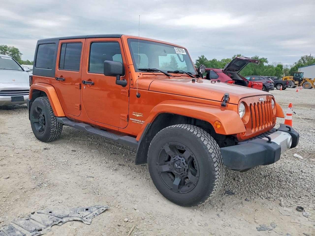 2011 Jeep Wrangler Unlimited Orange vin: 1J4HA5H11BL627103