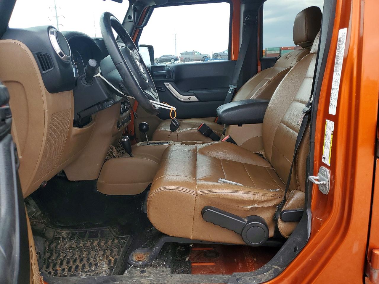 2011 Jeep Wrangler Unlimited Orange vin: 1J4HA5H11BL627103
