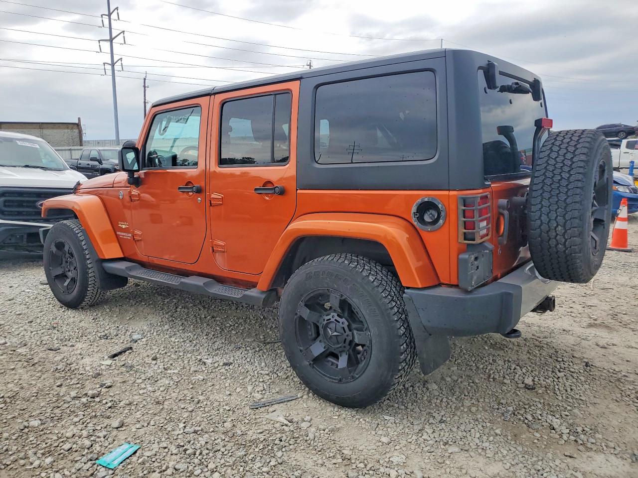2011 Jeep Wrangler Unlimited Orange vin: 1J4HA5H11BL627103