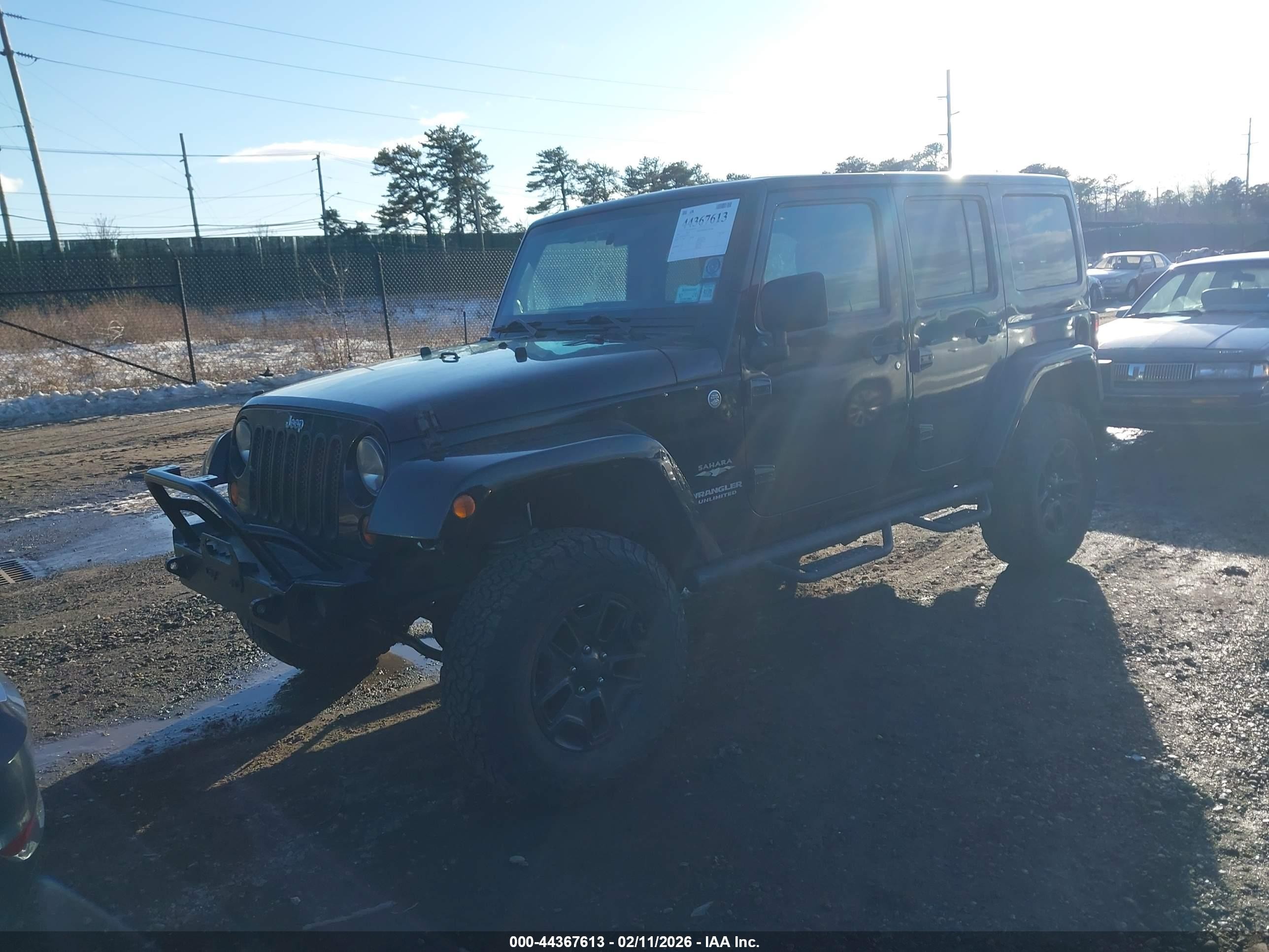 2011 Jeep Wrangler Unlimited Sahara Black vin: 1J4HA5H13BL513331