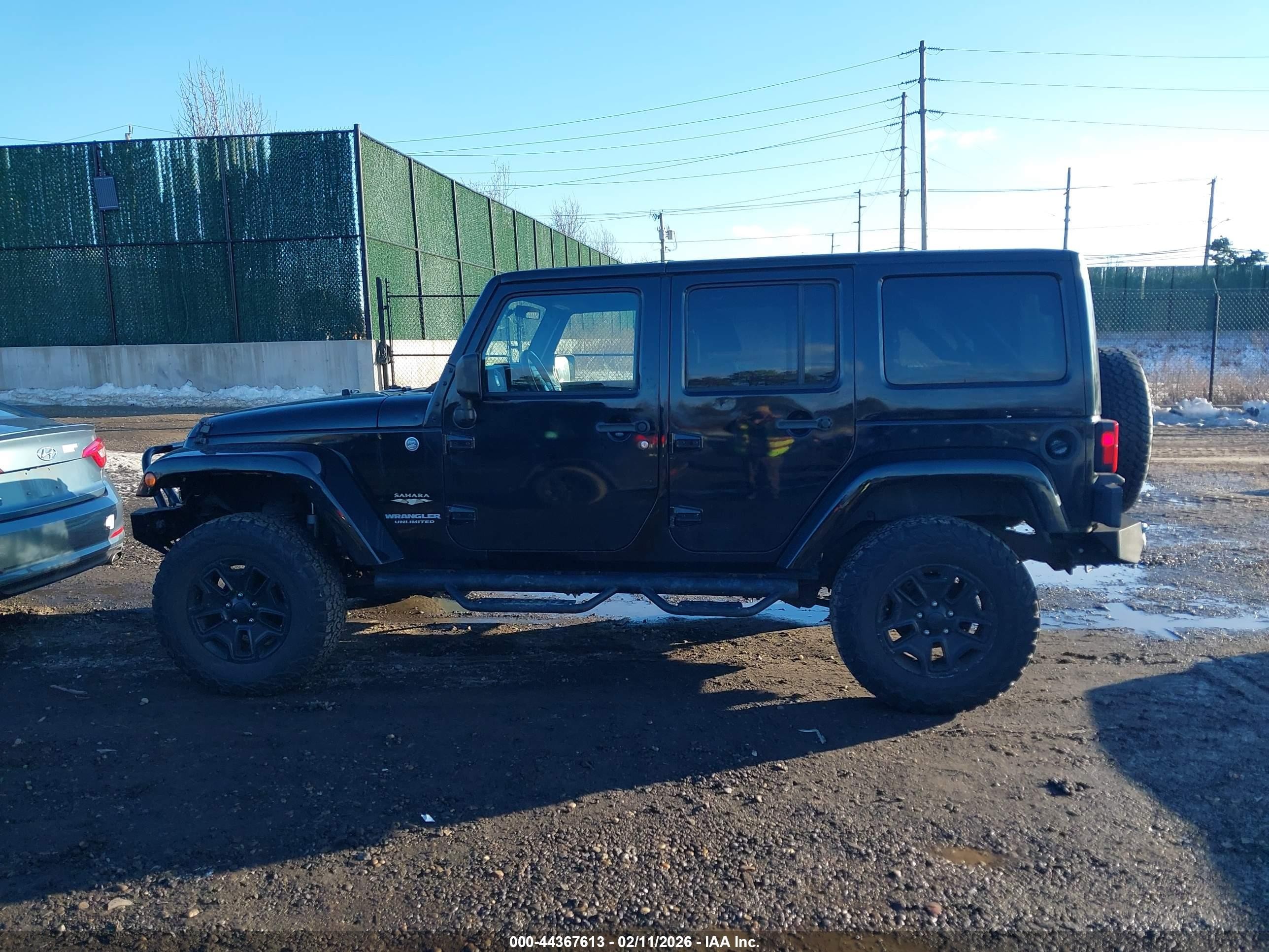 2011 Jeep Wrangler Unlimited Sahara Black vin: 1J4HA5H13BL513331