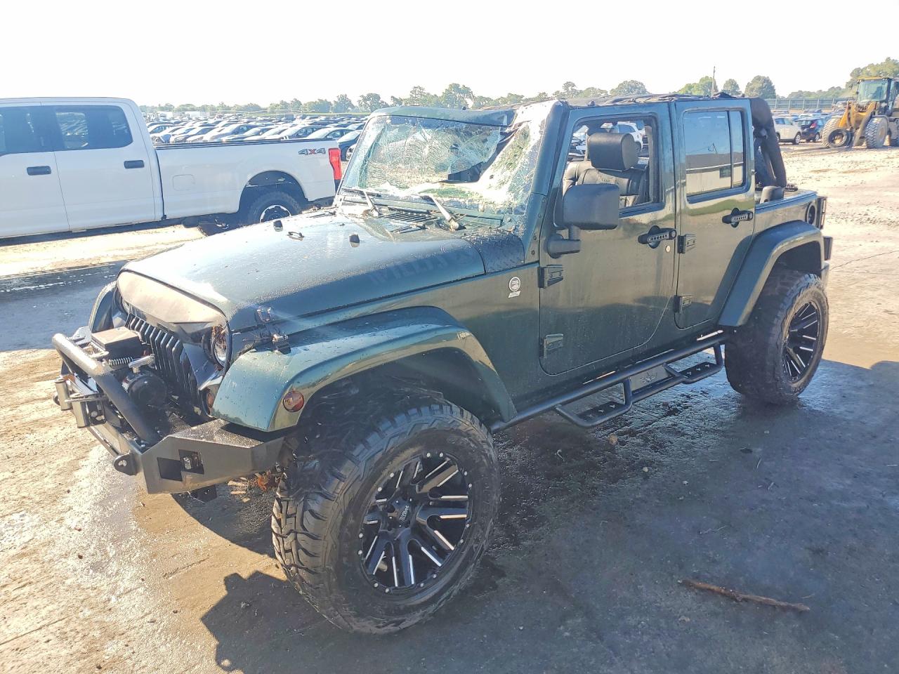 2010 Jeep Wrangler Unlimited Sahara Green vin: 1J4HA5H15AL146026