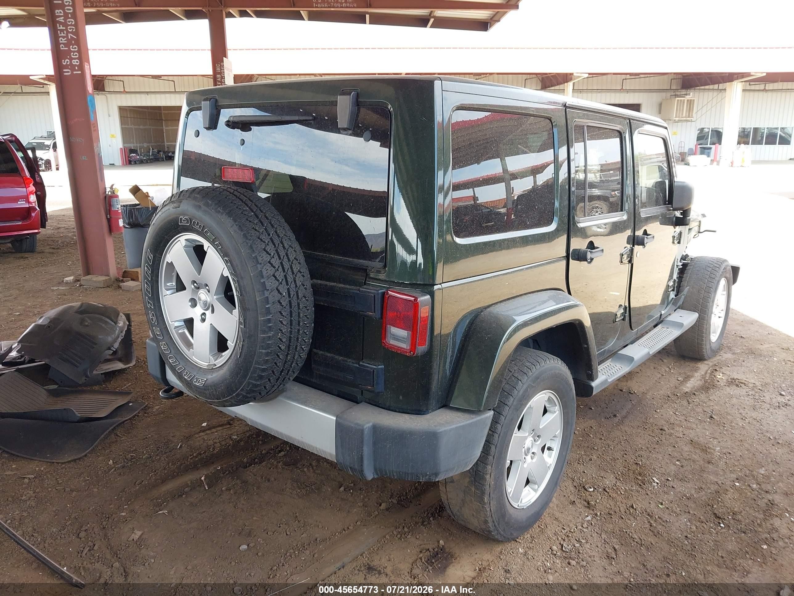2011 Jeep Wrangler Unlimited Sahara Зеленый vin: 1J4HA5H1XBL543877