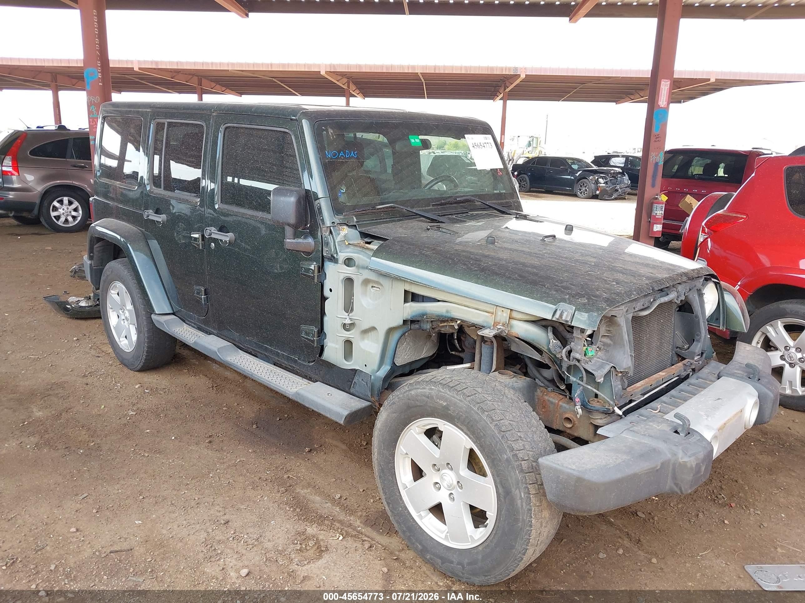 2011 Jeep Wrangler Unlimited Sahara Зеленый vin: 1J4HA5H1XBL543877