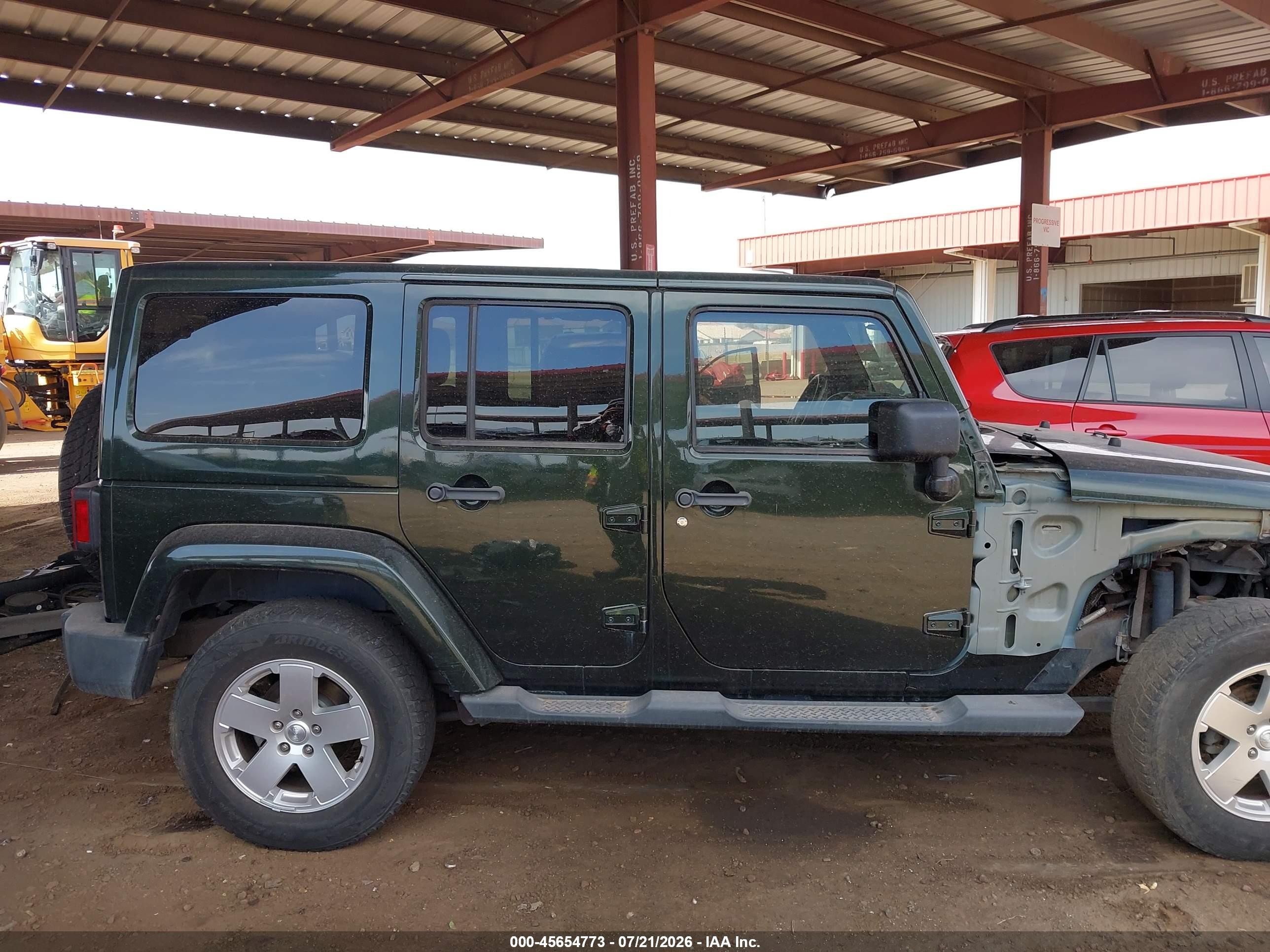2011 Jeep Wrangler Unlimited Sahara Зеленый vin: 1J4HA5H1XBL543877