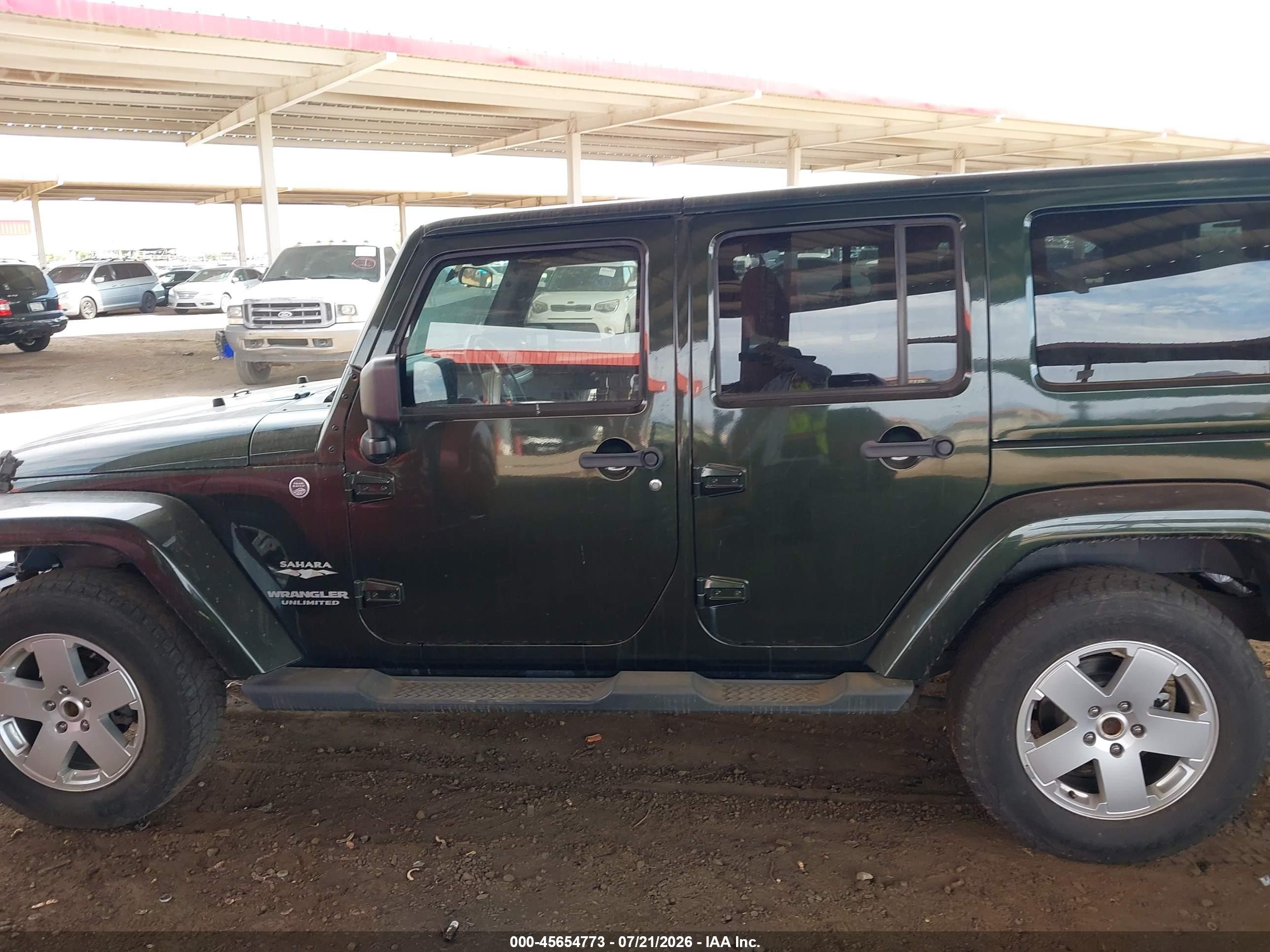 2011 Jeep Wrangler Unlimited Sahara Зеленый vin: 1J4HA5H1XBL543877