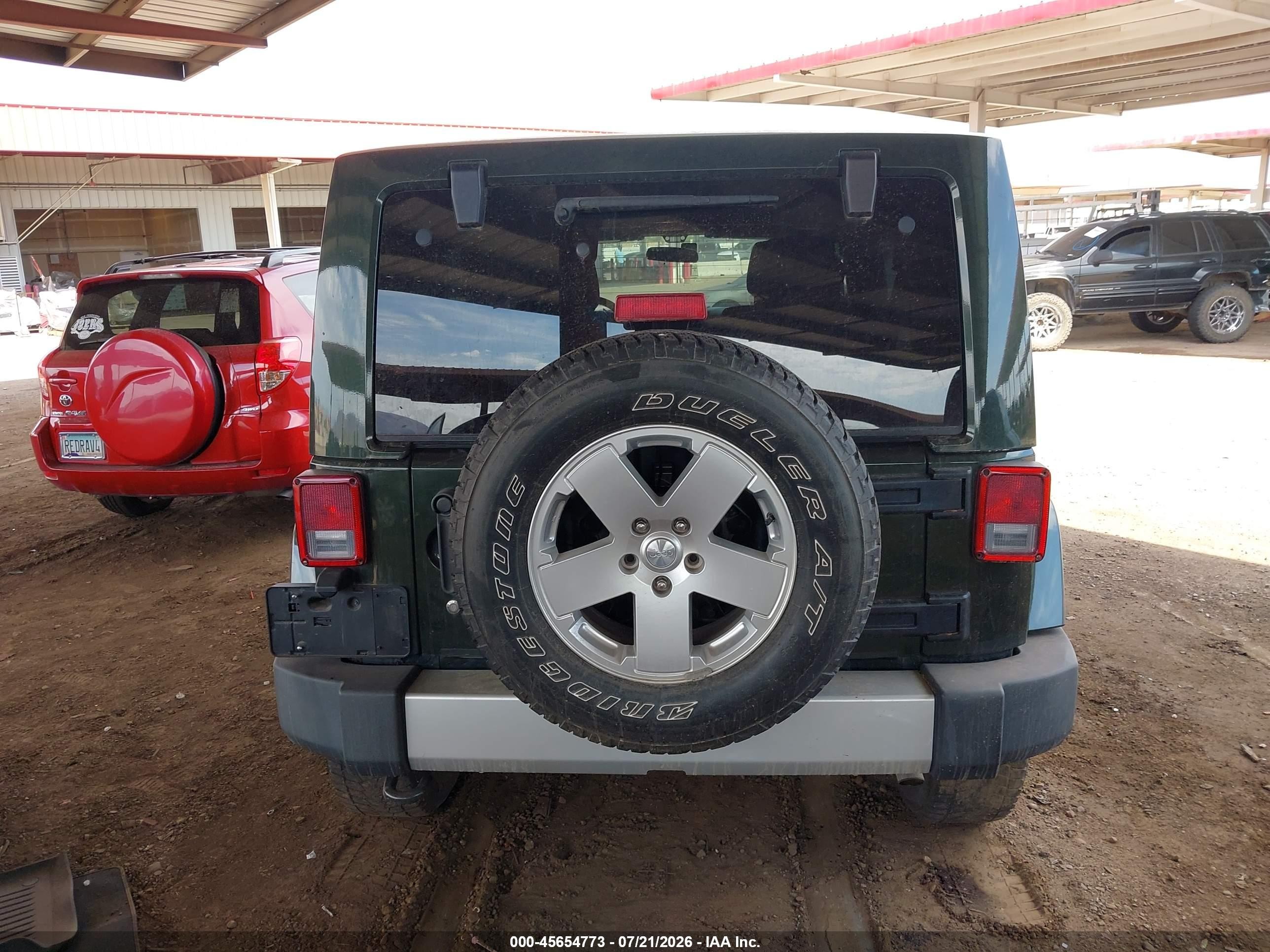 2011 Jeep Wrangler Unlimited Sahara Зеленый vin: 1J4HA5H1XBL543877
