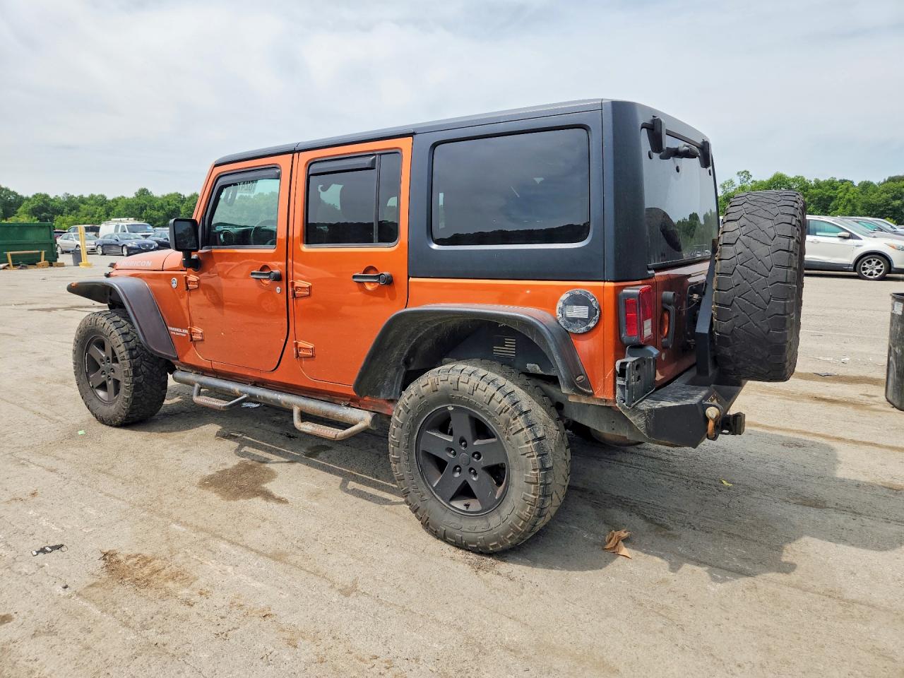 2011 Jeep Wrangler Unlimited Rubicon Orange vin: 1J4HA6H11BL641539