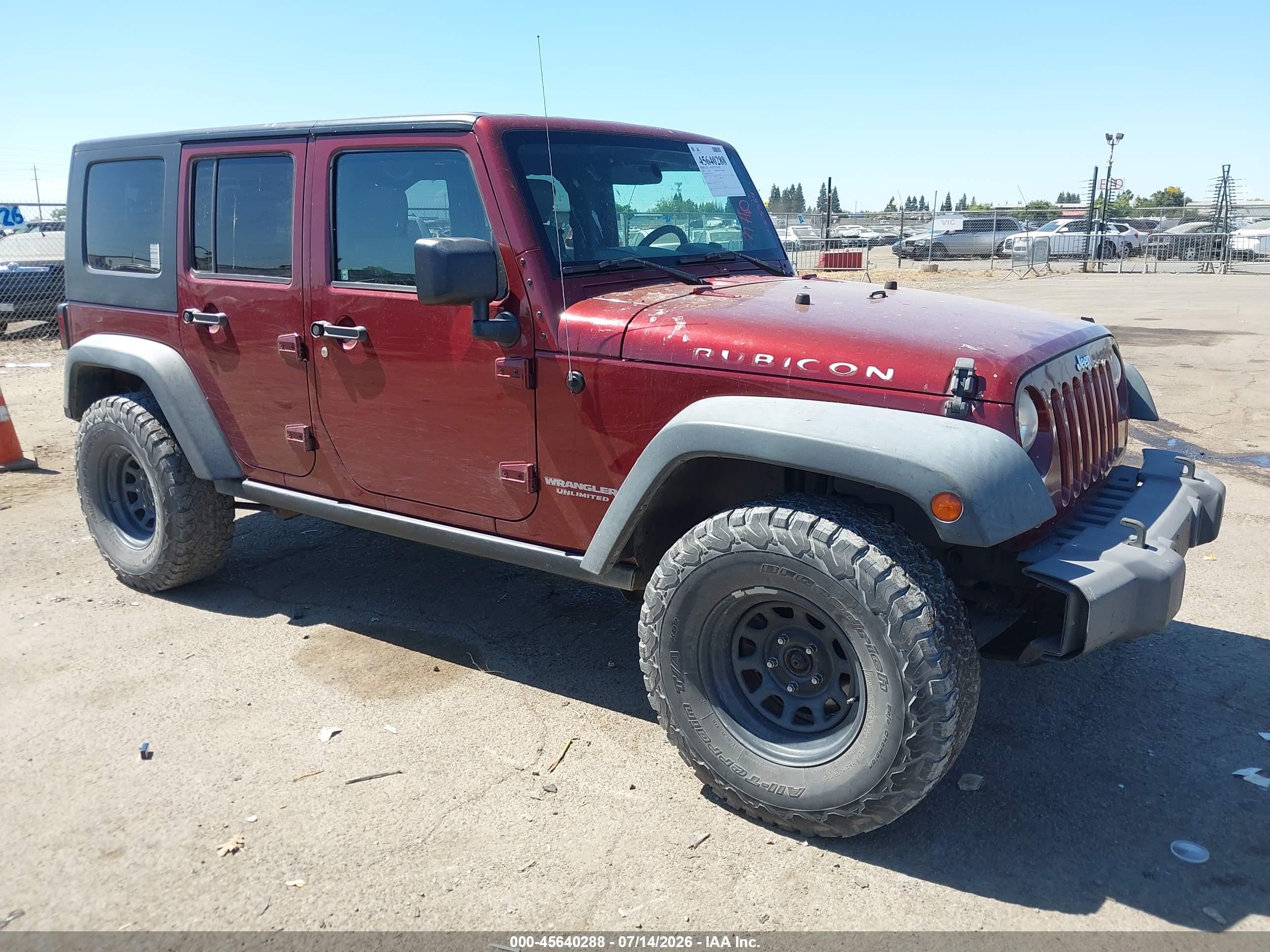 2010 Jeep Wrangler Unlimited Rubicon Burgundy vin: 1J4HA6H13AL233364