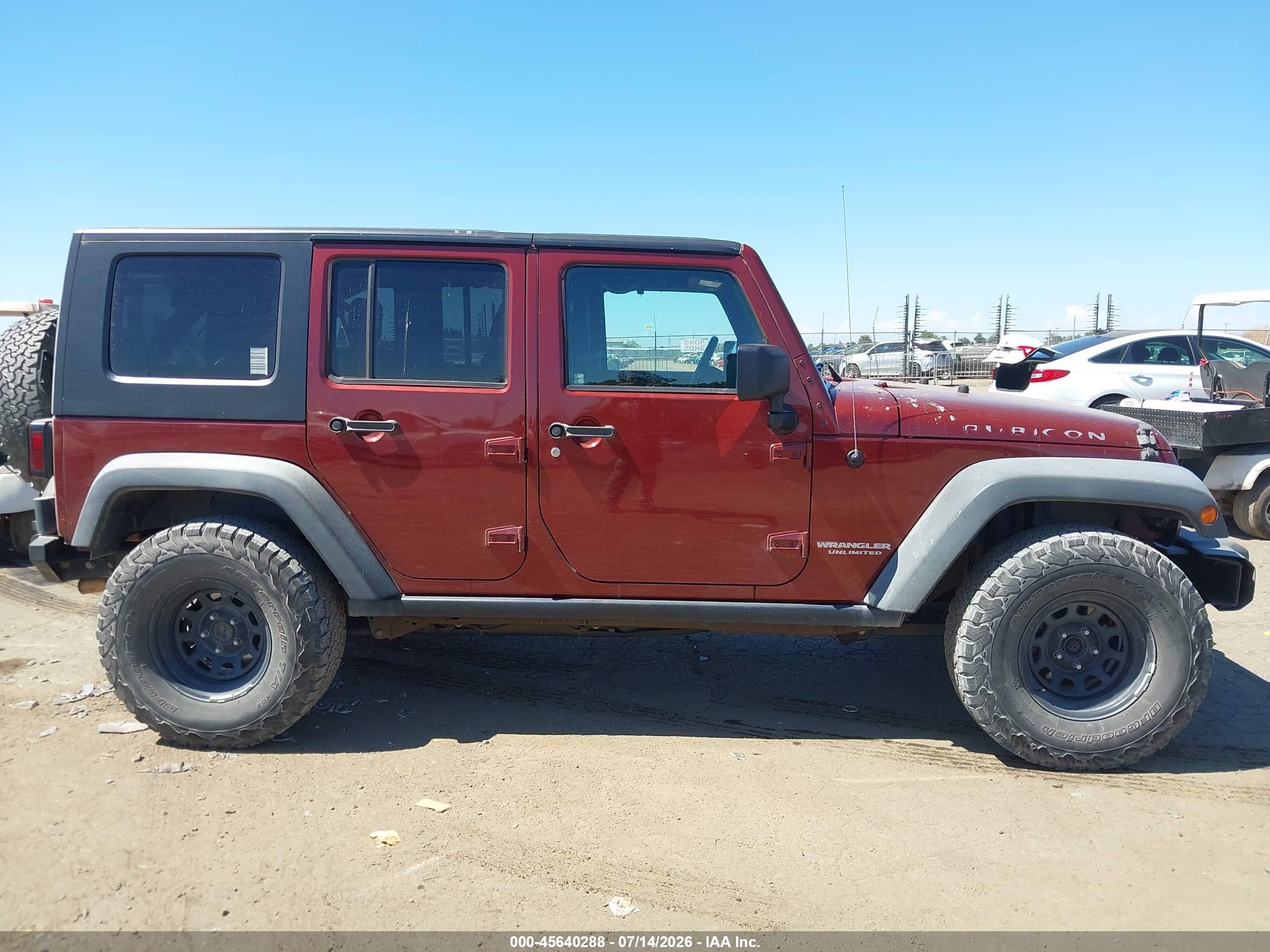 2010 Jeep Wrangler Unlimited Rubicon Burgundy vin: 1J4HA6H13AL233364