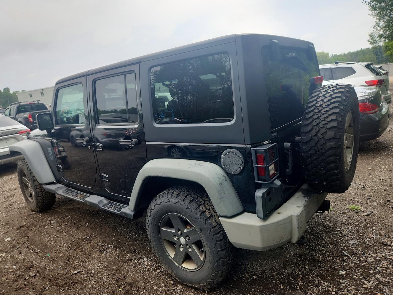 2011 Jeep Wrangler Unlimited Rubicon Черный vin: 1J4HA6H1XBL560233