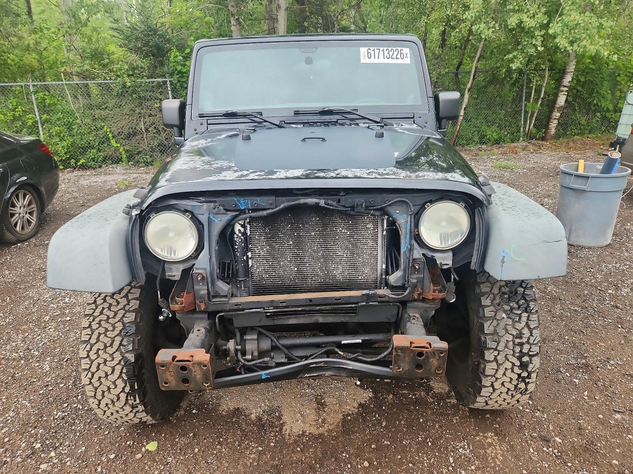 2011 Jeep Wrangler Unlimited Rubicon Черный vin: 1J4HA6H1XBL560233