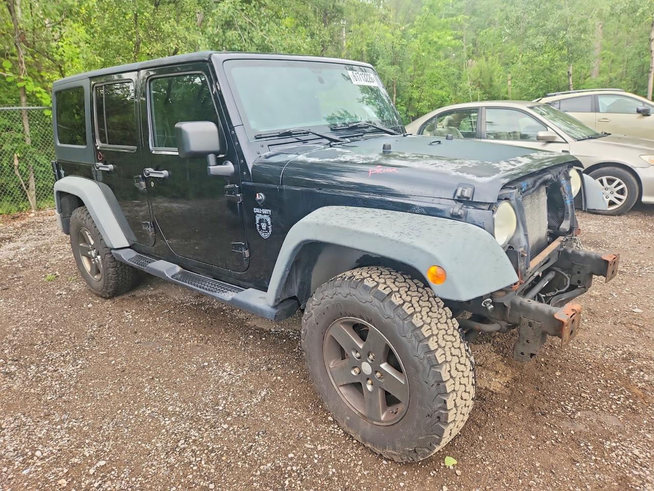 2011 Jeep Wrangler Unlimited Rubicon Черный vin: 1J4HA6H1XBL560233