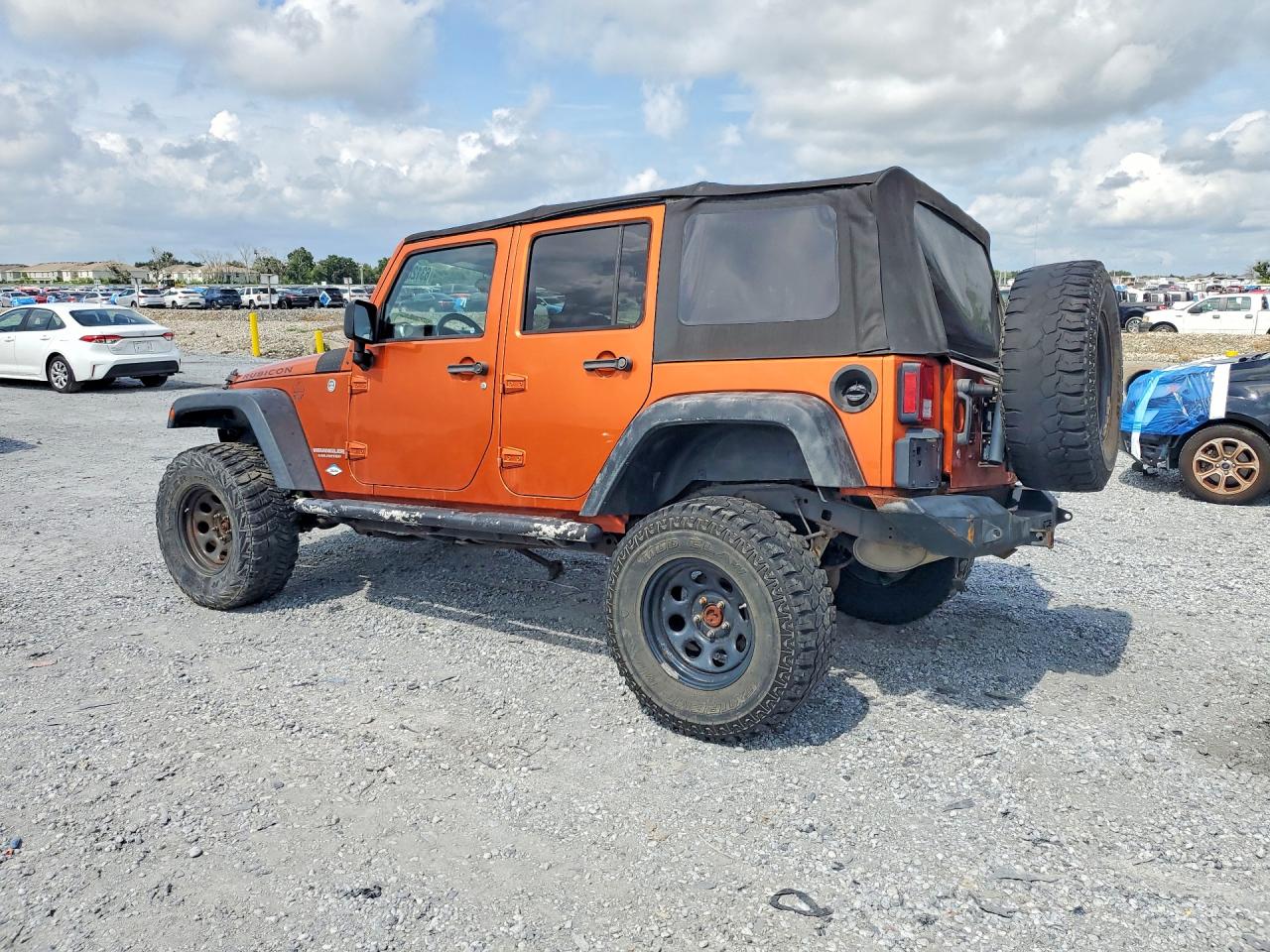 2011 Jeep Wrangler Unlimited Rubicon Orange vin: 1J4HA6H1XBL638459