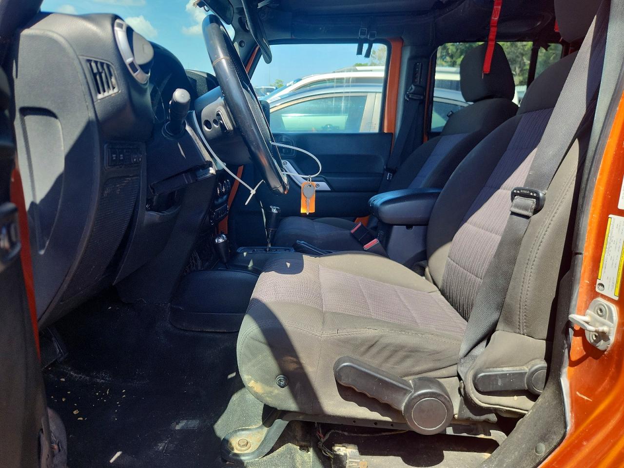 2011 Jeep Wrangler Unlimited Rubicon Orange vin: 1J4HA6H1XBL638459