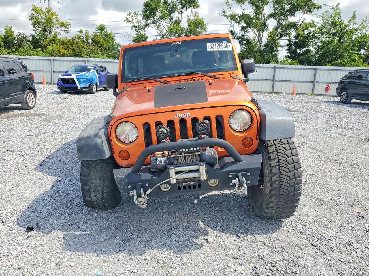 2011 Jeep Wrangler Unlimited Rubicon Orange vin: 1J4HA6H1XBL638459