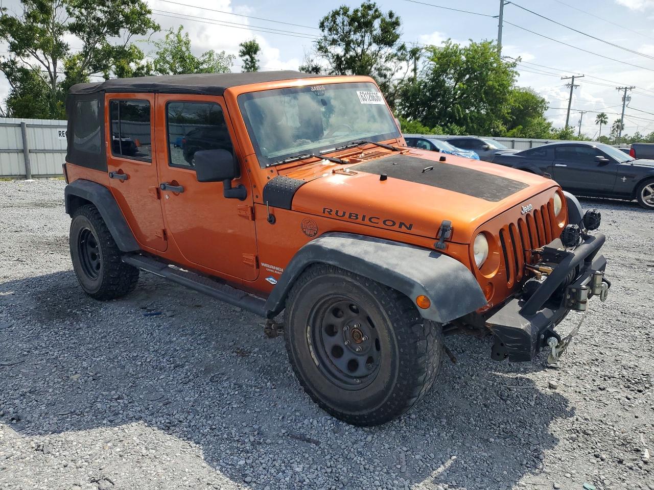 2011 Jeep Wrangler Unlimited Rubicon Orange vin: 1J4HA6H1XBL638459