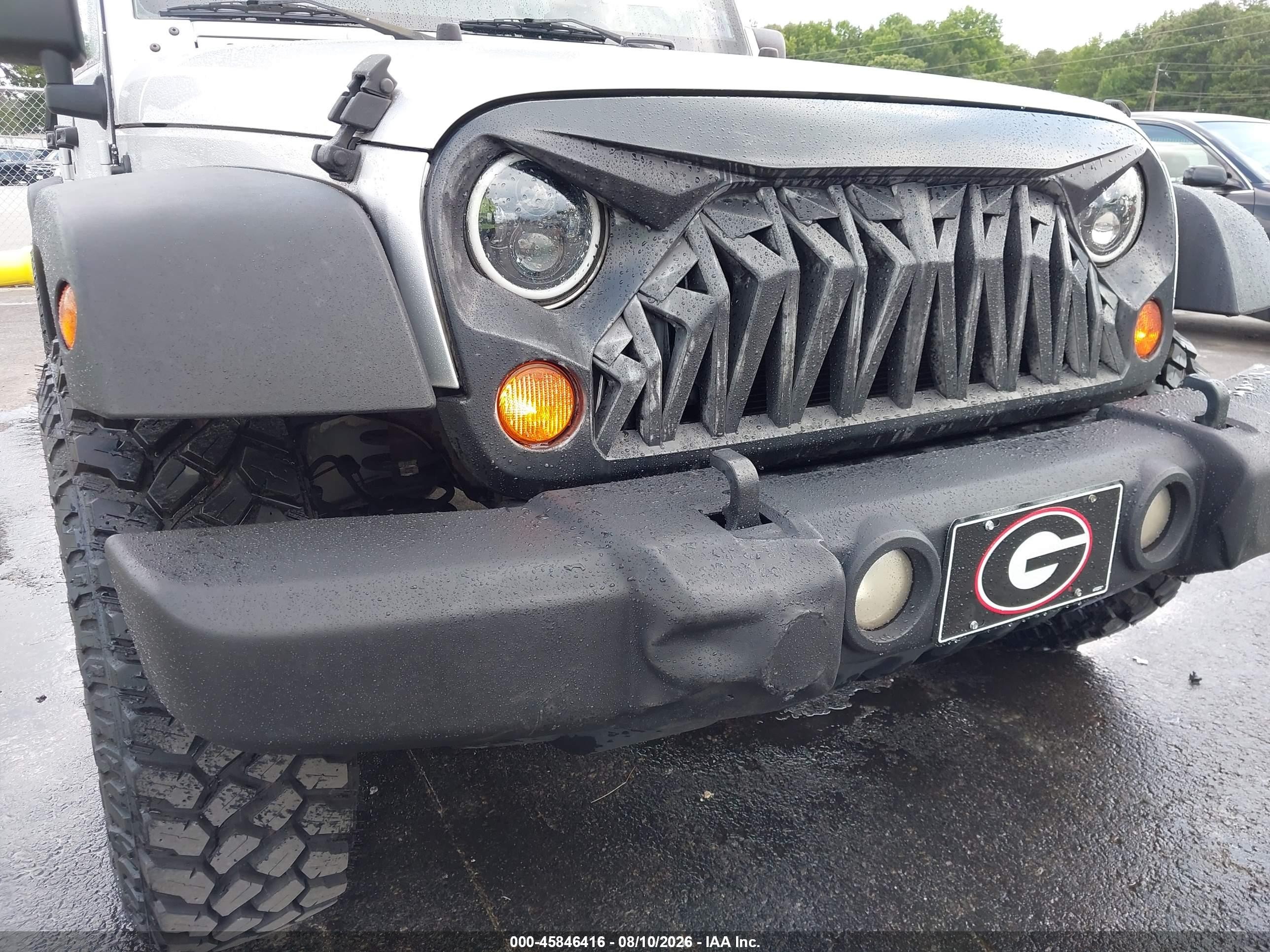 2010 Jeep Wrangler Unlimited Sport Серебряный vin: 1J4HB3H16AL165685
