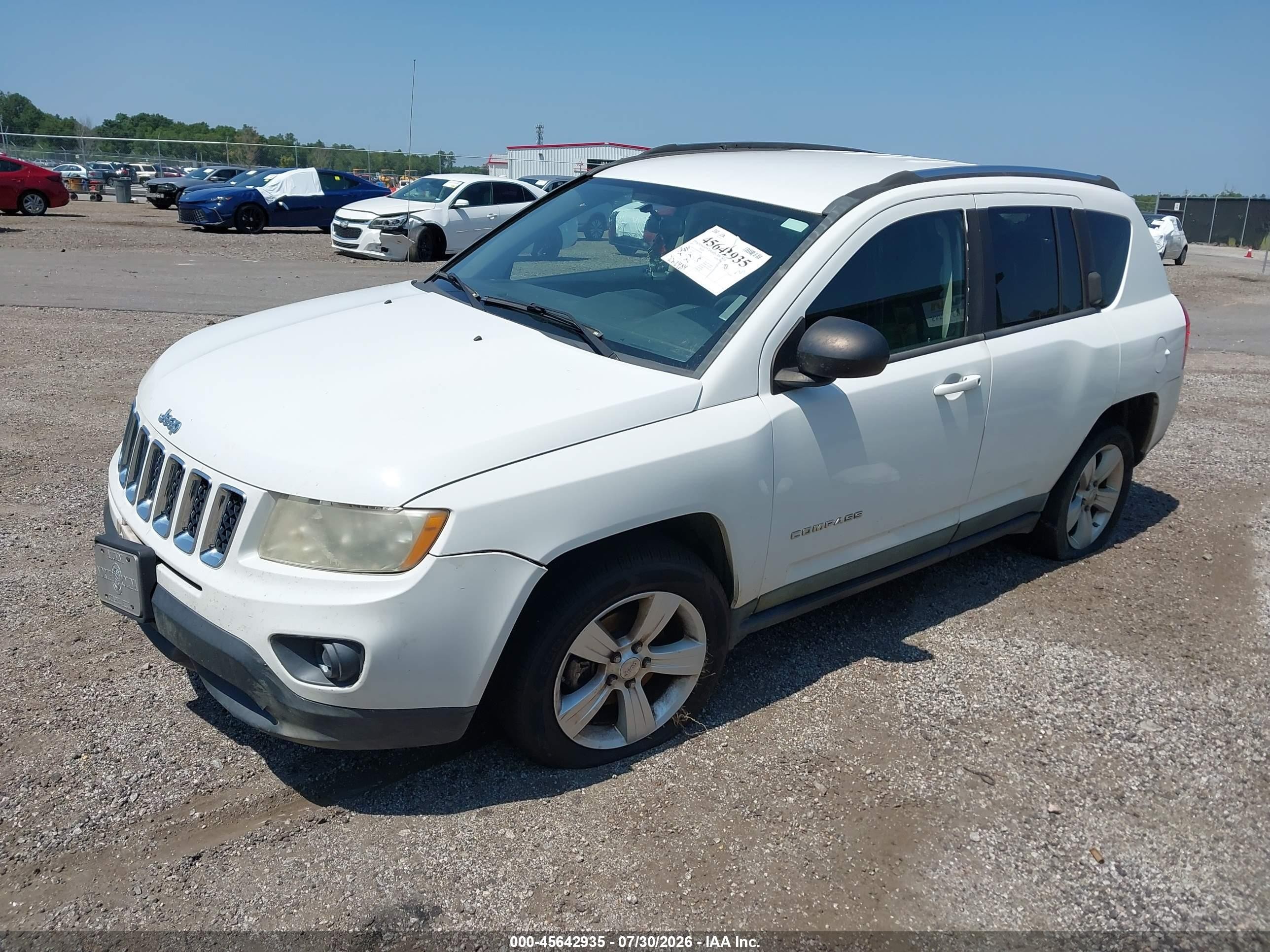 2011 Jeep Compass   White vin: 1J4NF1FB5BD250620