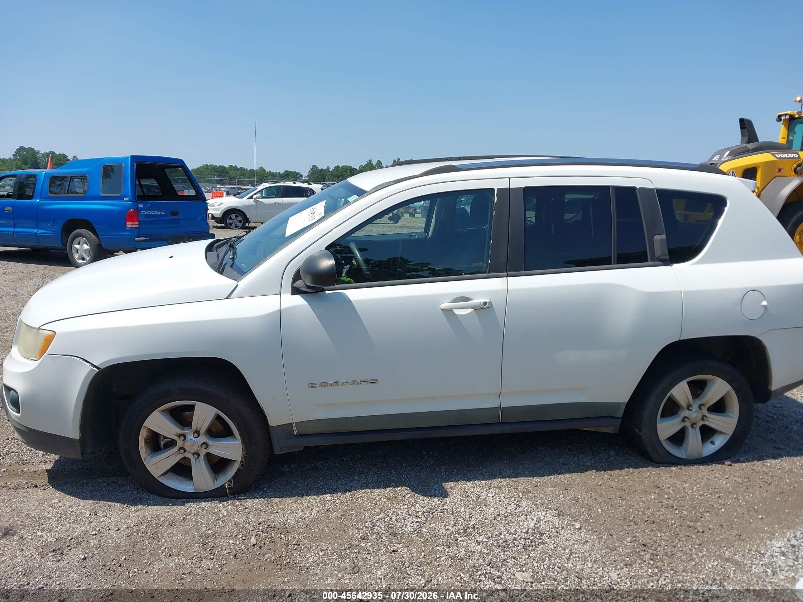 2011 Jeep Compass   White vin: 1J4NF1FB5BD250620