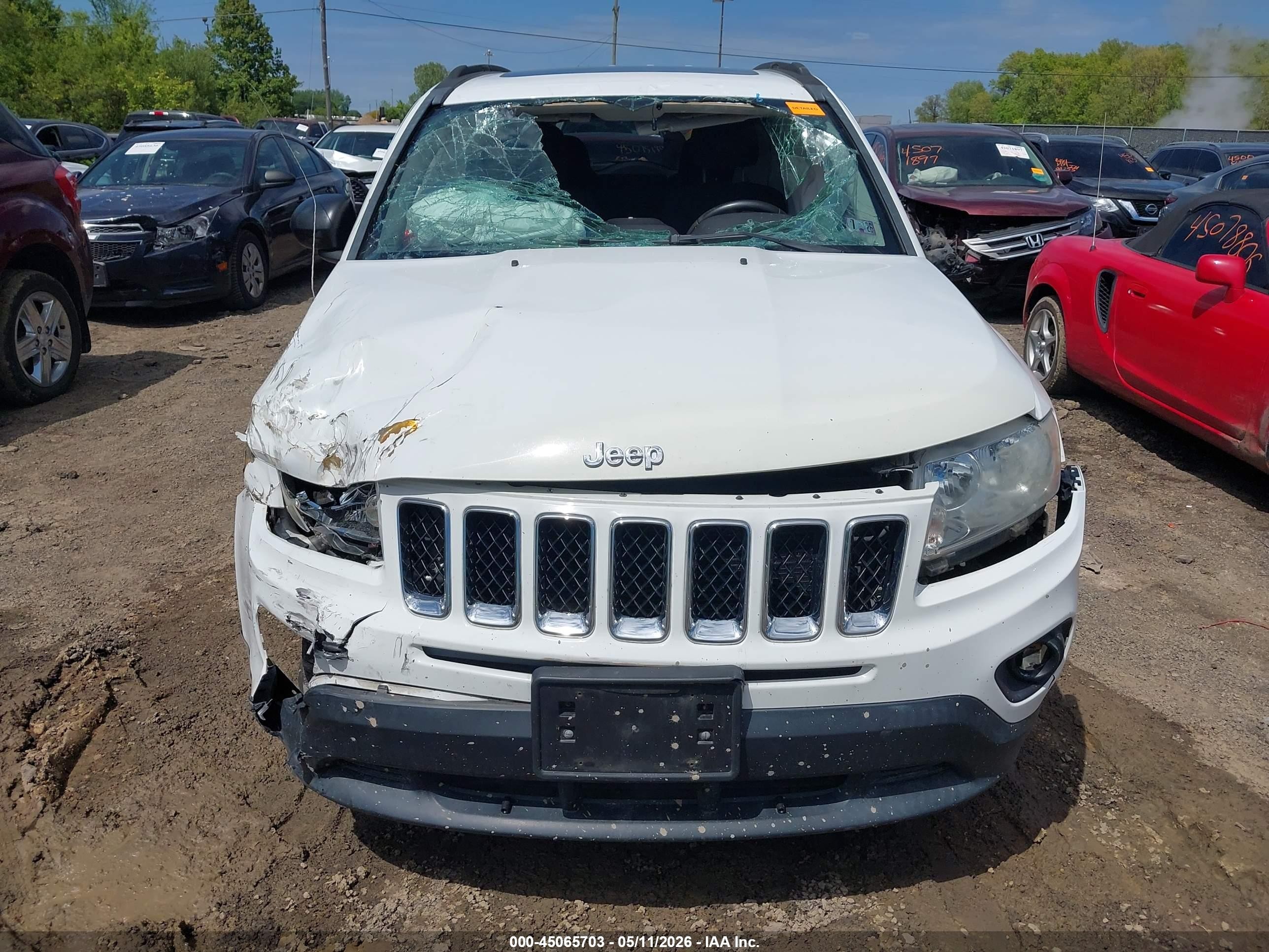 2011 Jeep Compass   White vin: 1J4NF1FB8BD244522