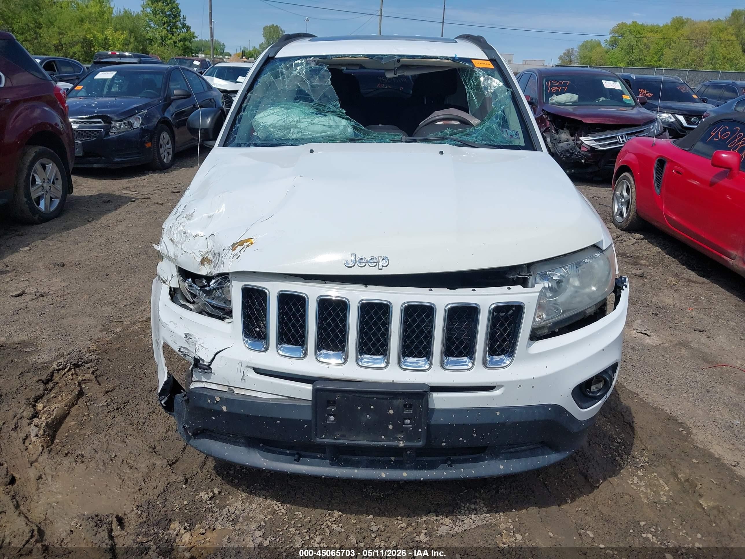 2011 Jeep Compass   White vin: 1J4NF1FB8BD244522