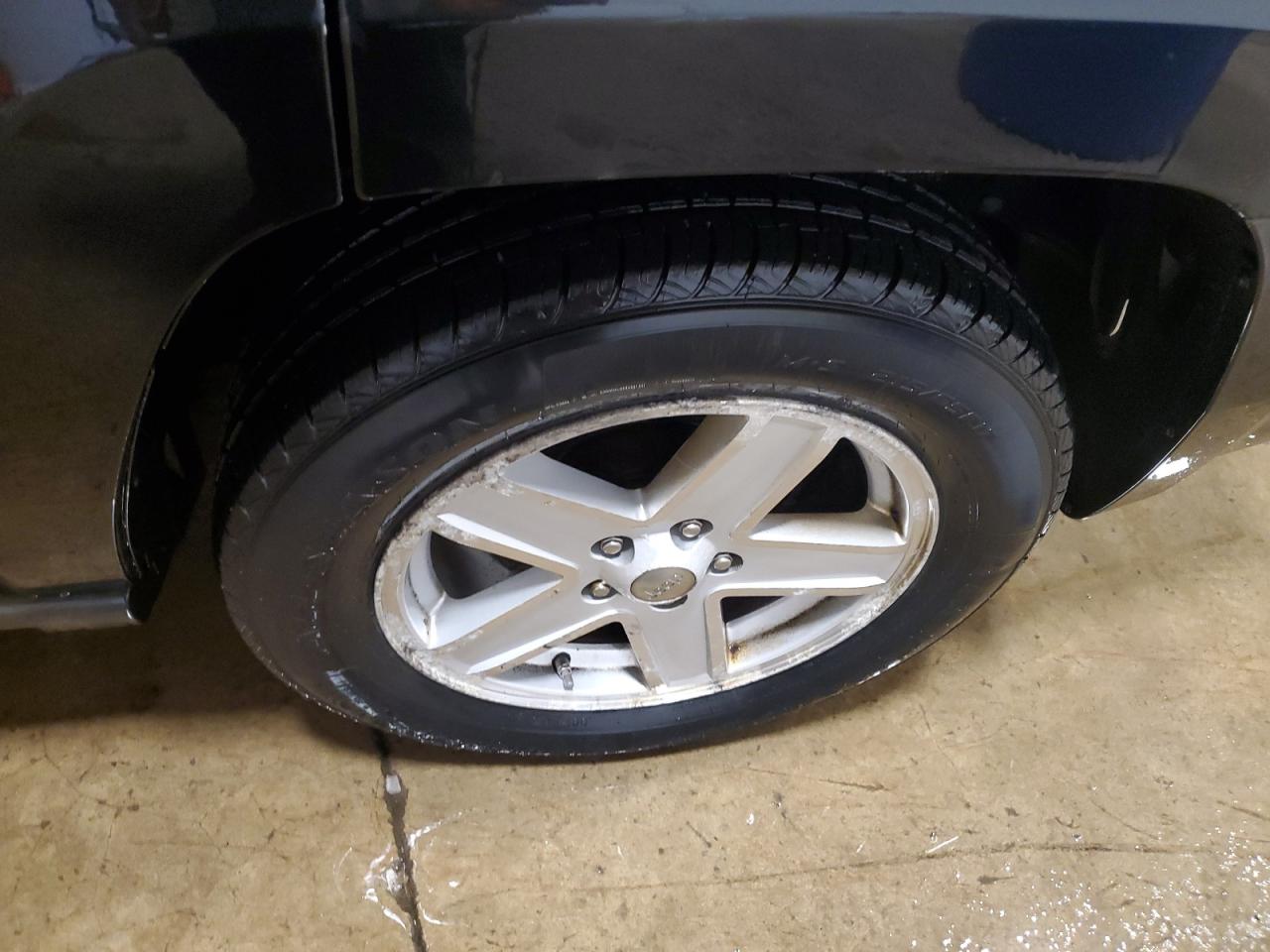 2010 Jeep Patriot Sport Black vin: 1J4NF1GBXAD642957 Damage: Left Rear Wheel, Curb Rash, > 12 Inches