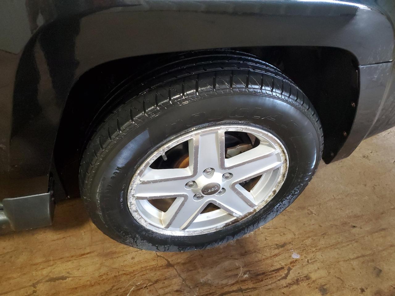 2010 Jeep Patriot Sport Black vin: 1J4NF1GBXAD642957 Damage: Right Front Wheel, Curb Rash, > 12 Inches